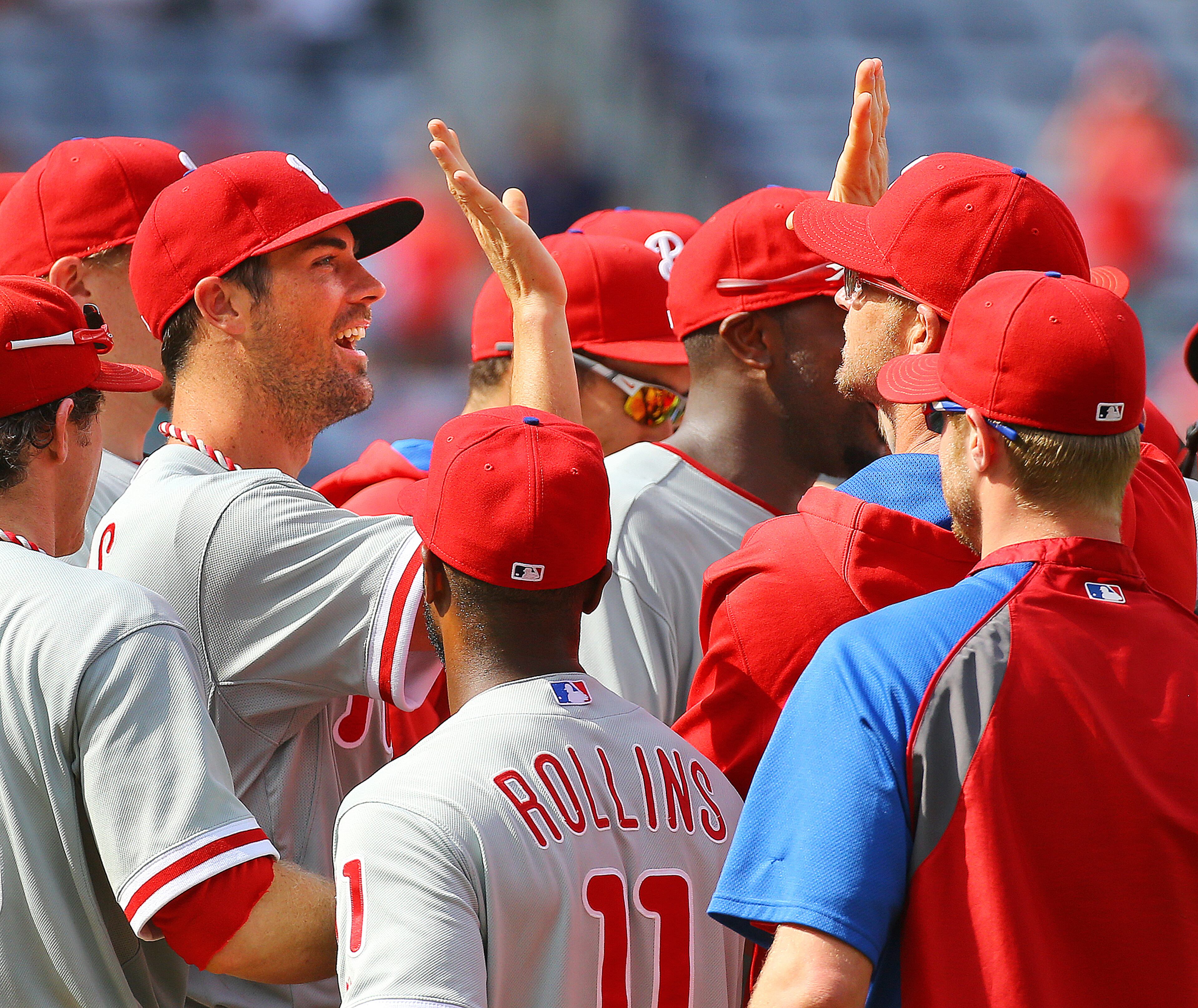 Cole Hamels (left) and the Phillies celebrate a 7-0 no hitter against the Braves in a baseball game in Atlanta on Monday, Sept. 1, 2014. Hamels went six innings in the no hitter by a combination of four pitchers. CURTIS COMPTON / CCOMPTON@AJC.COM