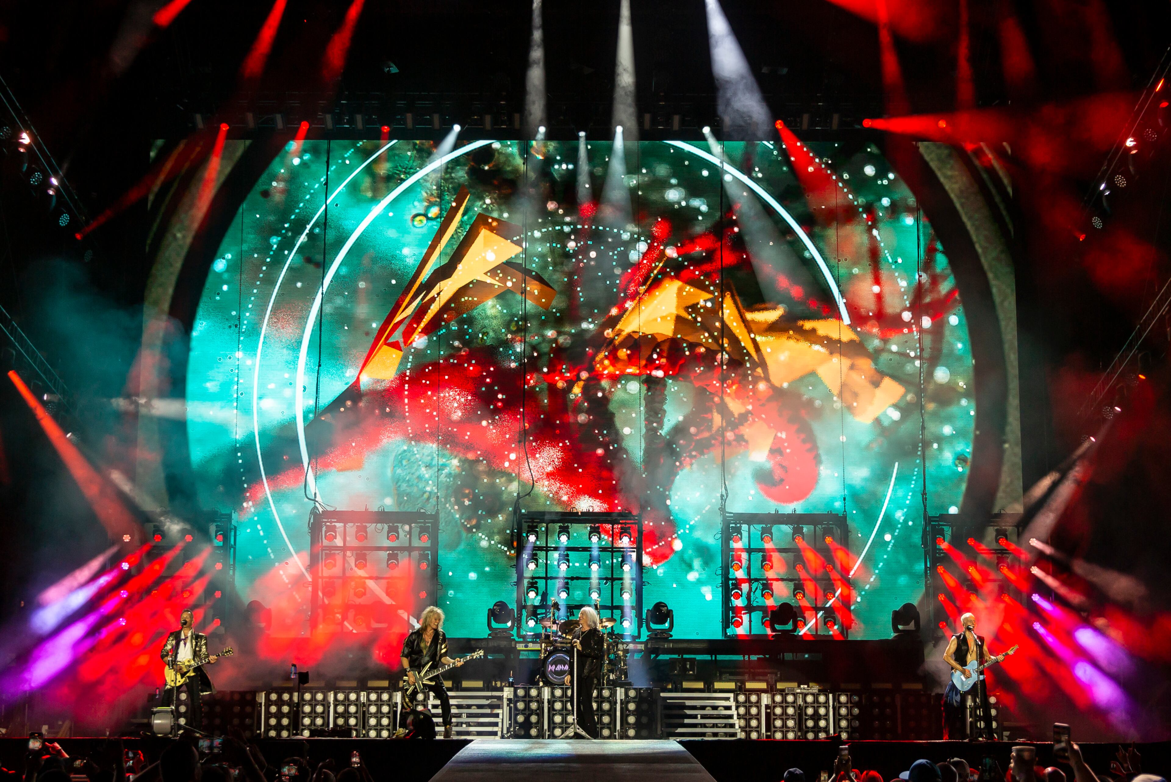 Def Leppard rocks the crowd with all the hits spanning their 48 year career at Truist Park in Atlanta on Saturday, July 13, 2024. (RYAN FLEISHER FOR THE ATLANTA JOURNAL-CONSTITUTION)