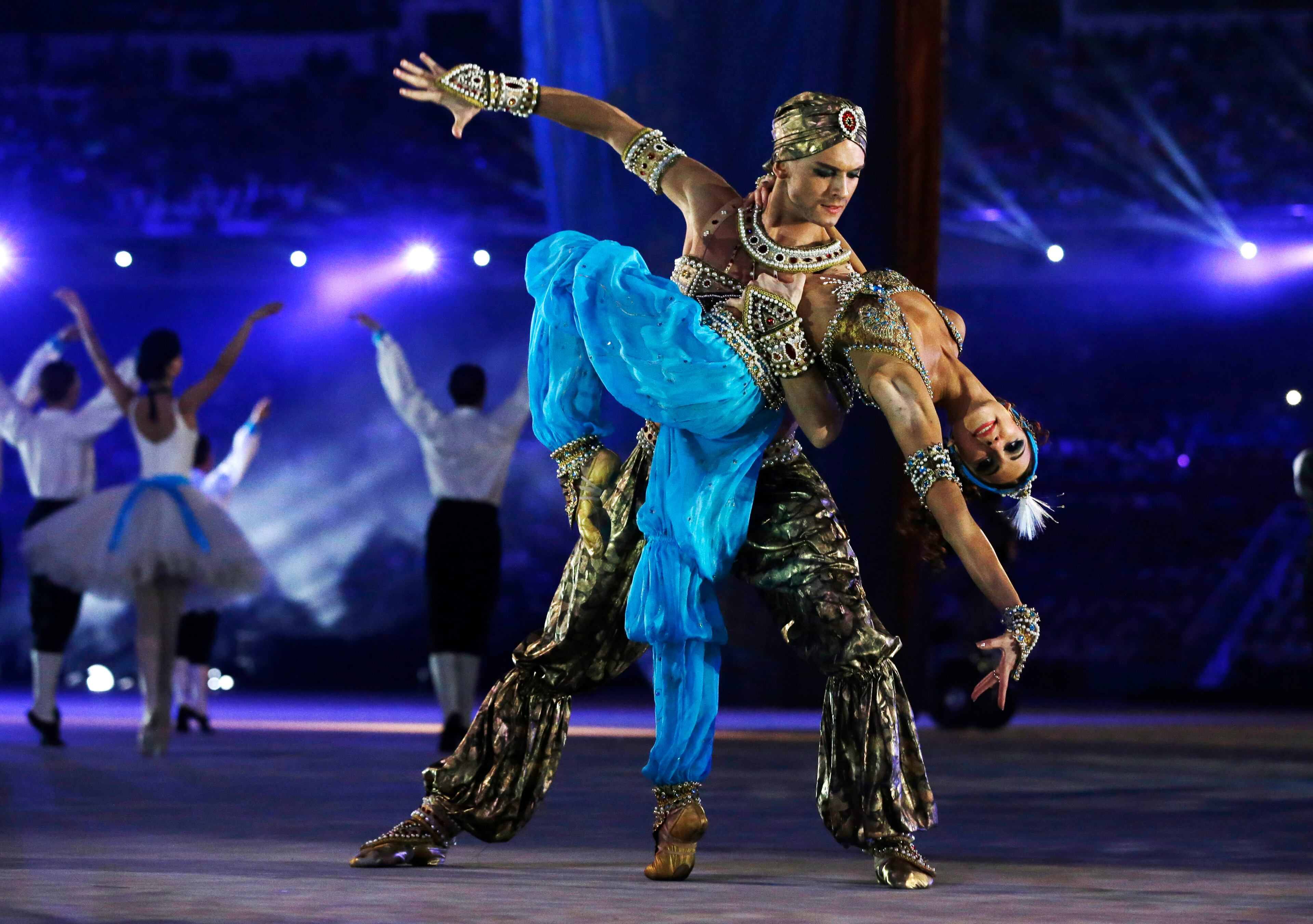 Performers dance during the closing ceremony of the 2014 Winter Olympics, Sunday, Feb. 23, 2014, in Sochi, Russia. (AP Photo/Darron Cummings)