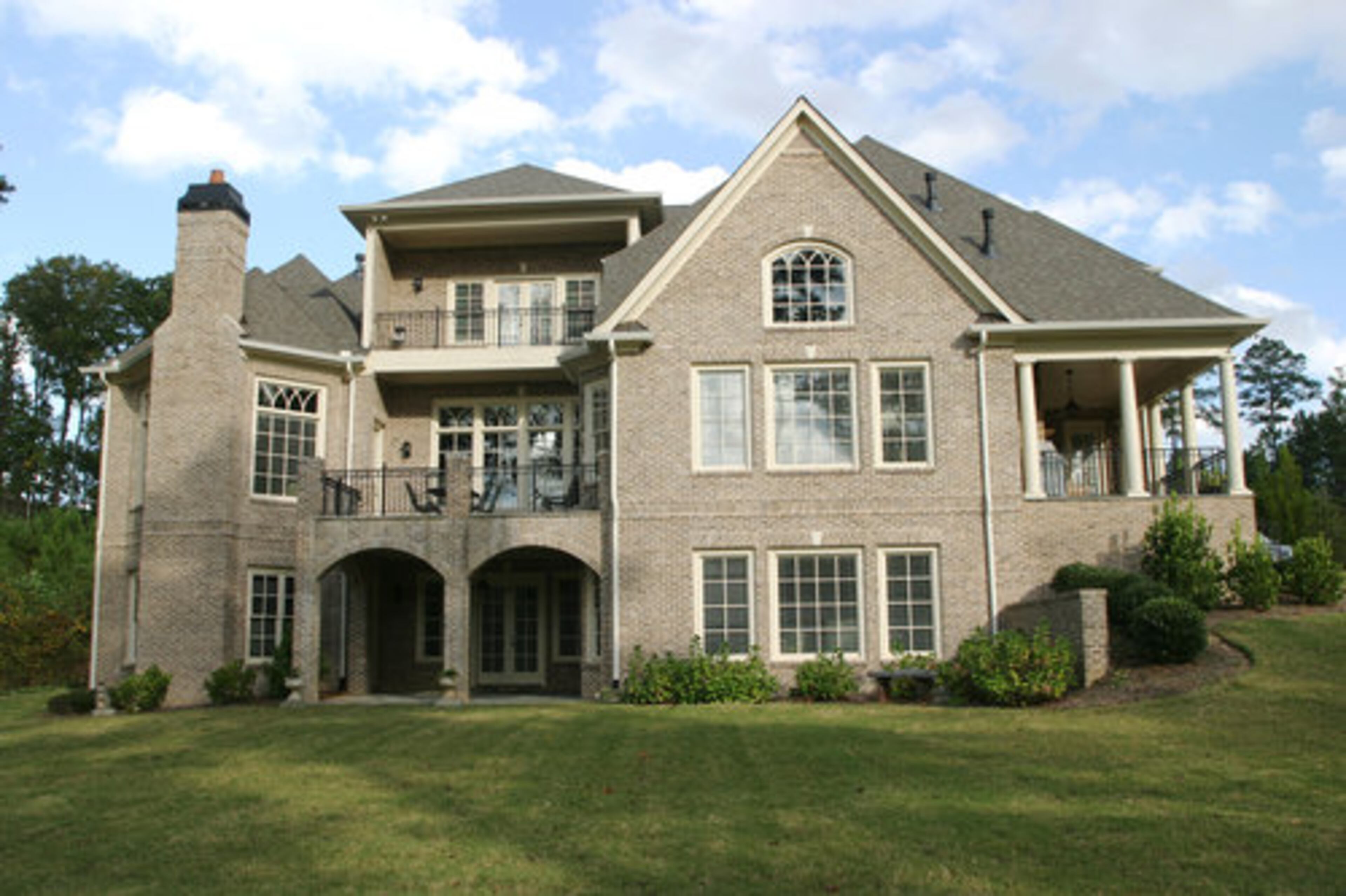 The home of Lois and Tom Bafas is among 18 homes built in the gated golf community Echelon in Cherokee County. The community was originally earmarked with 88 lots framing a sprawling golf course, with a luxury clubhouse, tennis courts and swimming pool. Tom adores the view of his home from the backyard (pictured).