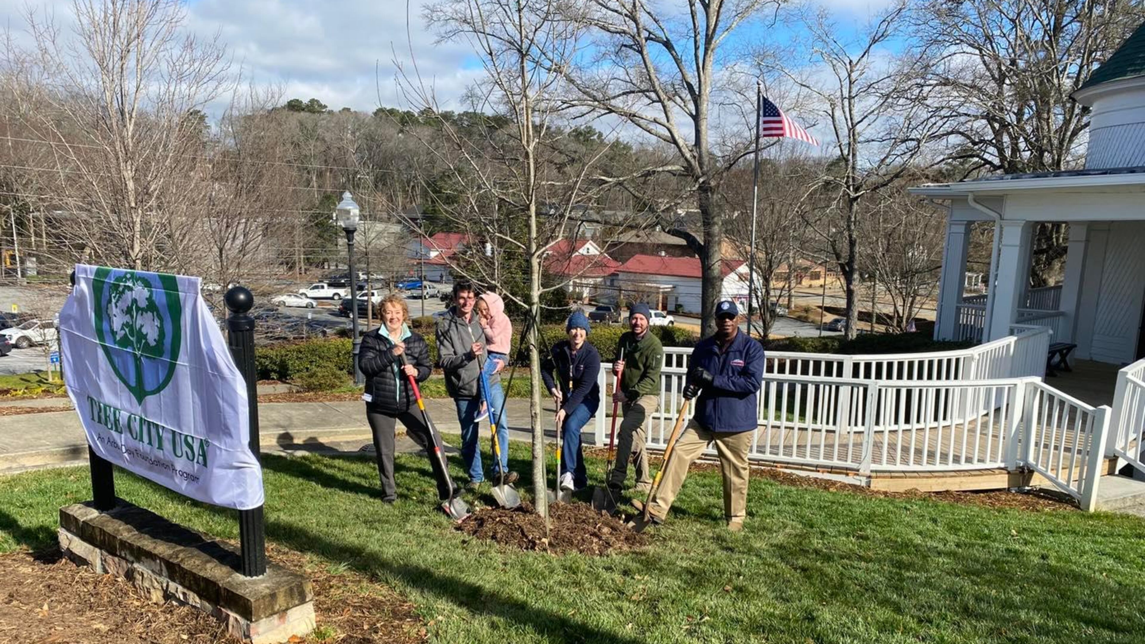 Pictured left to right at the Norcross Arbor Day tree planting are Tree Preservation Board Chair Charlotte Osborn, Councilmember Josh Bare, Community Development Director Tracy Rye, City Arborist Daniel Tew and Mayor Craig Newton. (Courtesy City of Norcross)