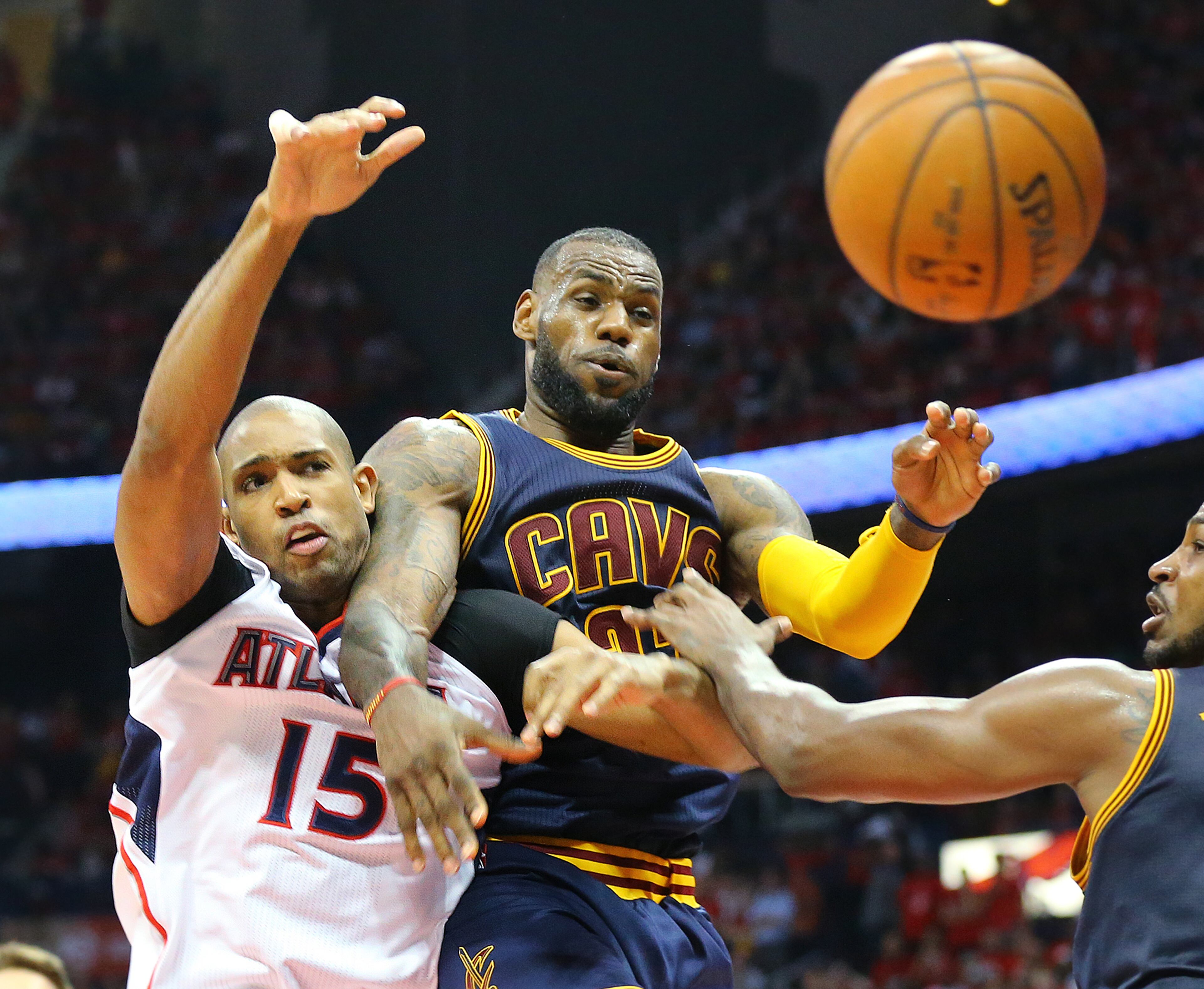 Hawks Al Horford battles Cavaliers LeBron James under the basket in game 1 of the Eastern Conference Finals on Wednesday, May 20, 2015, in Atlanta. The Cavaliers won the game 97-89. Curtis Compton / ccompton@ajc.com