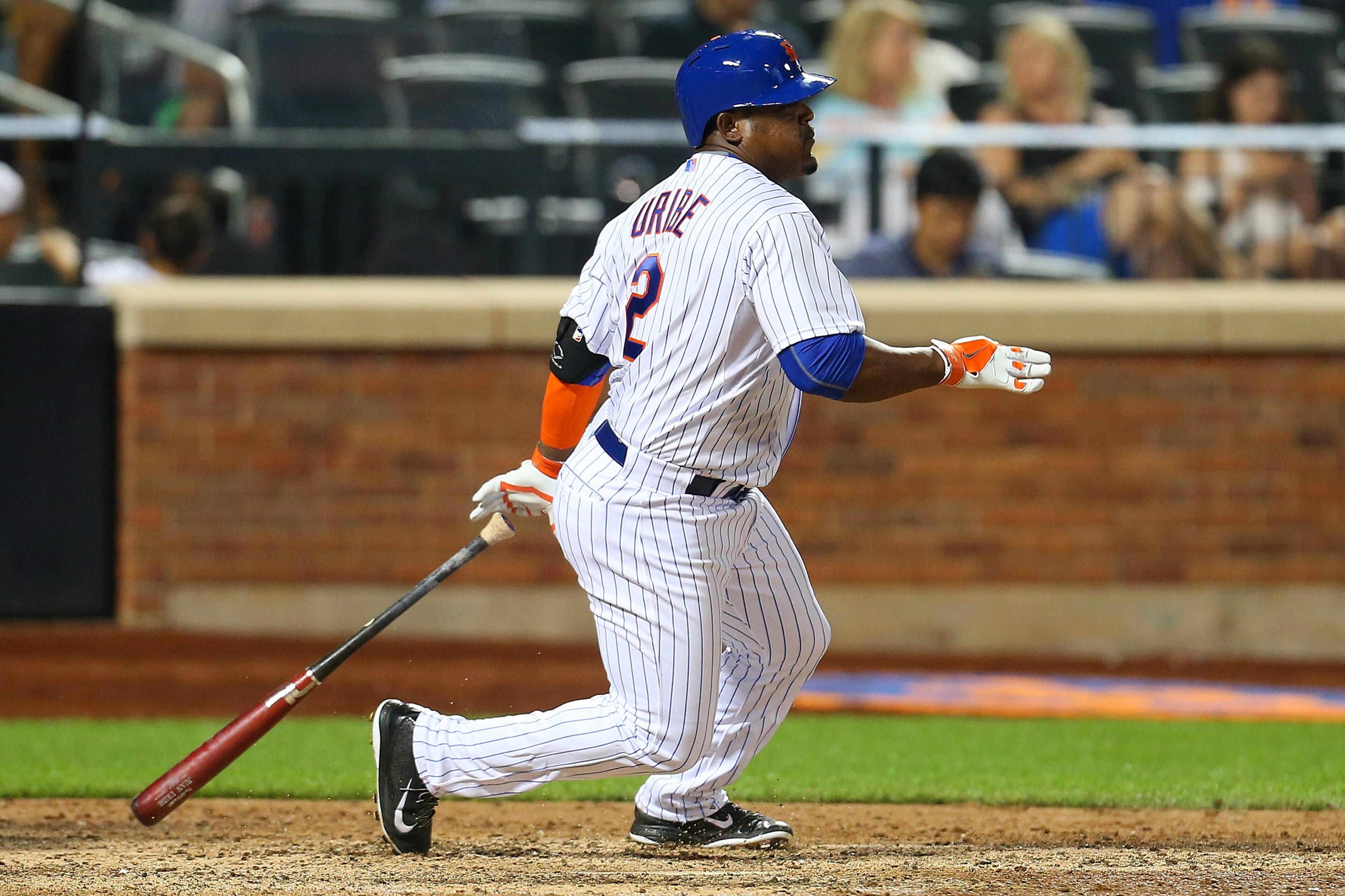 Juan Uribe #2 of the New York Mets hits a single in the eighth inning against the Los Angeles Dodgers at Citi Field on July 25, 2015 in Flushing neighborhood of the Queens borough of New York City. (Photo by Mike Stobe/Getty Images)