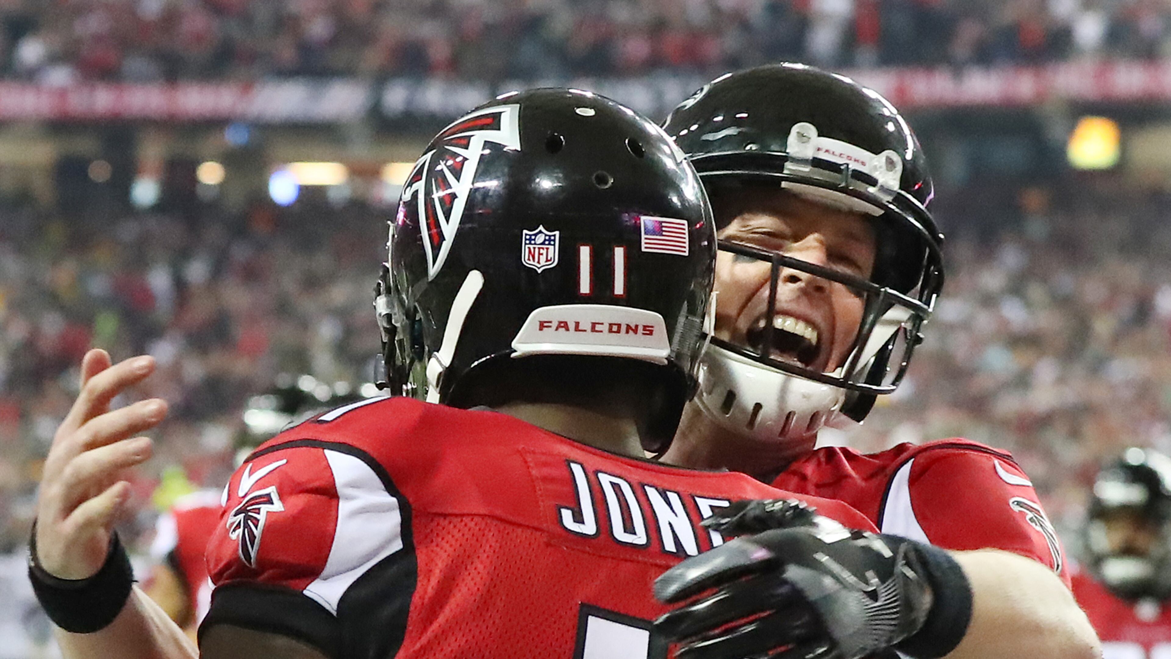 Soon to be bobbleheads? Matt Ryan and Julio Jones celebrate during last Sunday’s NFC Championship Game win over the Green Bay Packers. The victory vaulted the Falcons into the Super Bowl, which, if they win, will result in some of the team being immortalized as bobbleheads. Curtis Compton/AJC