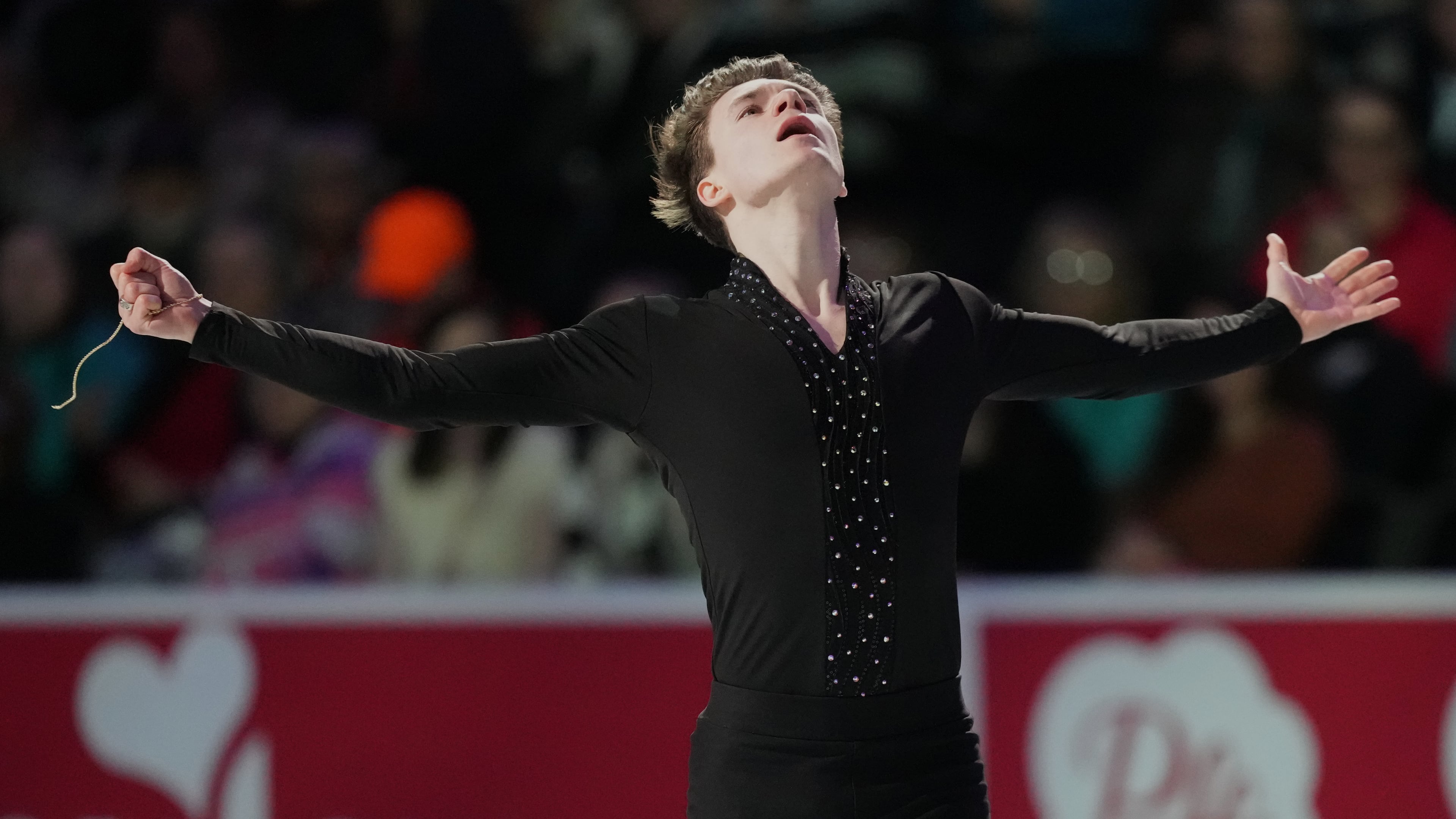 Maxim Naumov skates during the "Making Team USA" performance at the U.S. Figure Skating Championships, Sunday, Jan. 11, 2026, in St. Louis. (AP Photo/Stephanie Scarbrough)