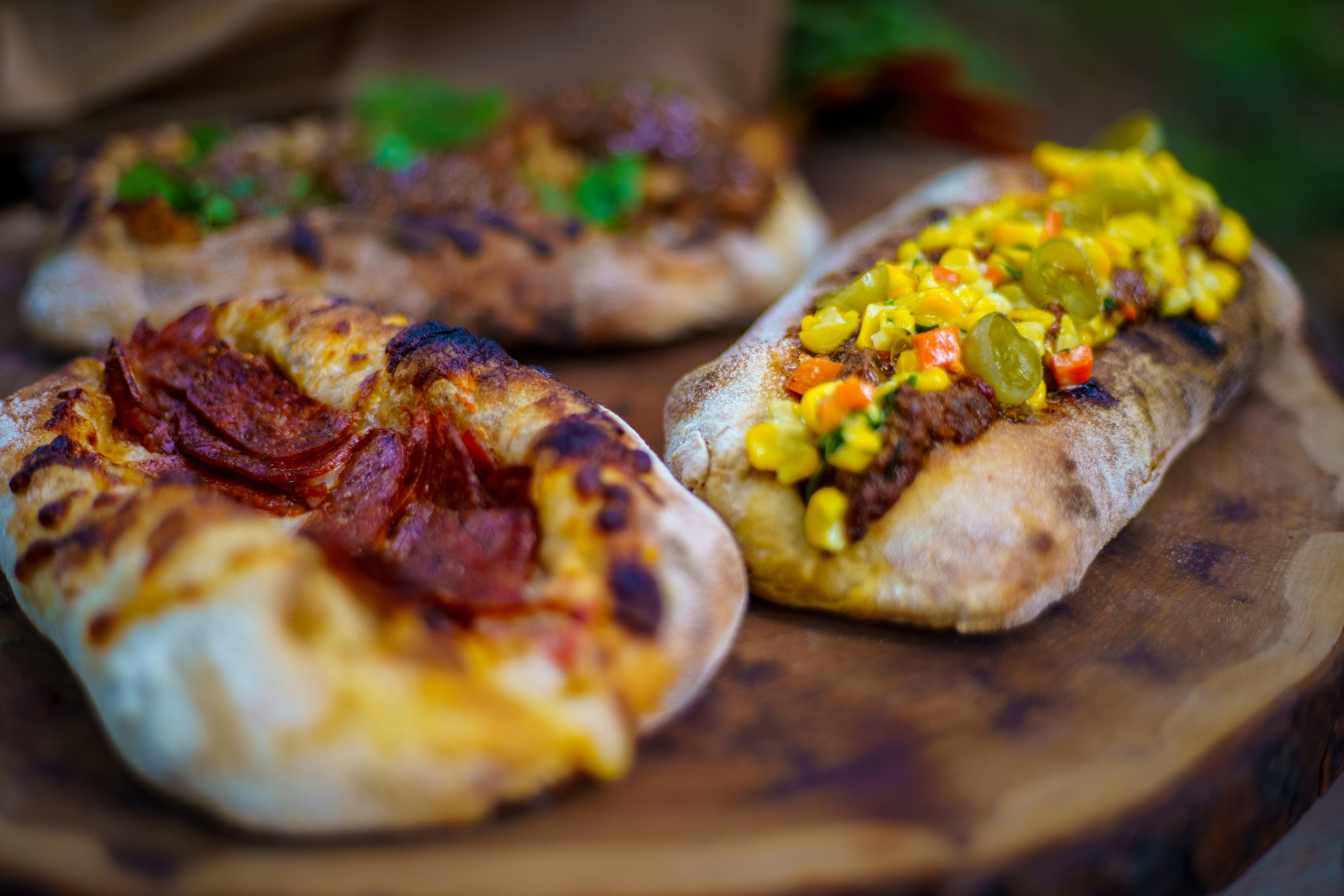 Oso Smoke & Dough’s pepperoni osito and middy glizzy osito. (Courtesy of Erin Zellers)