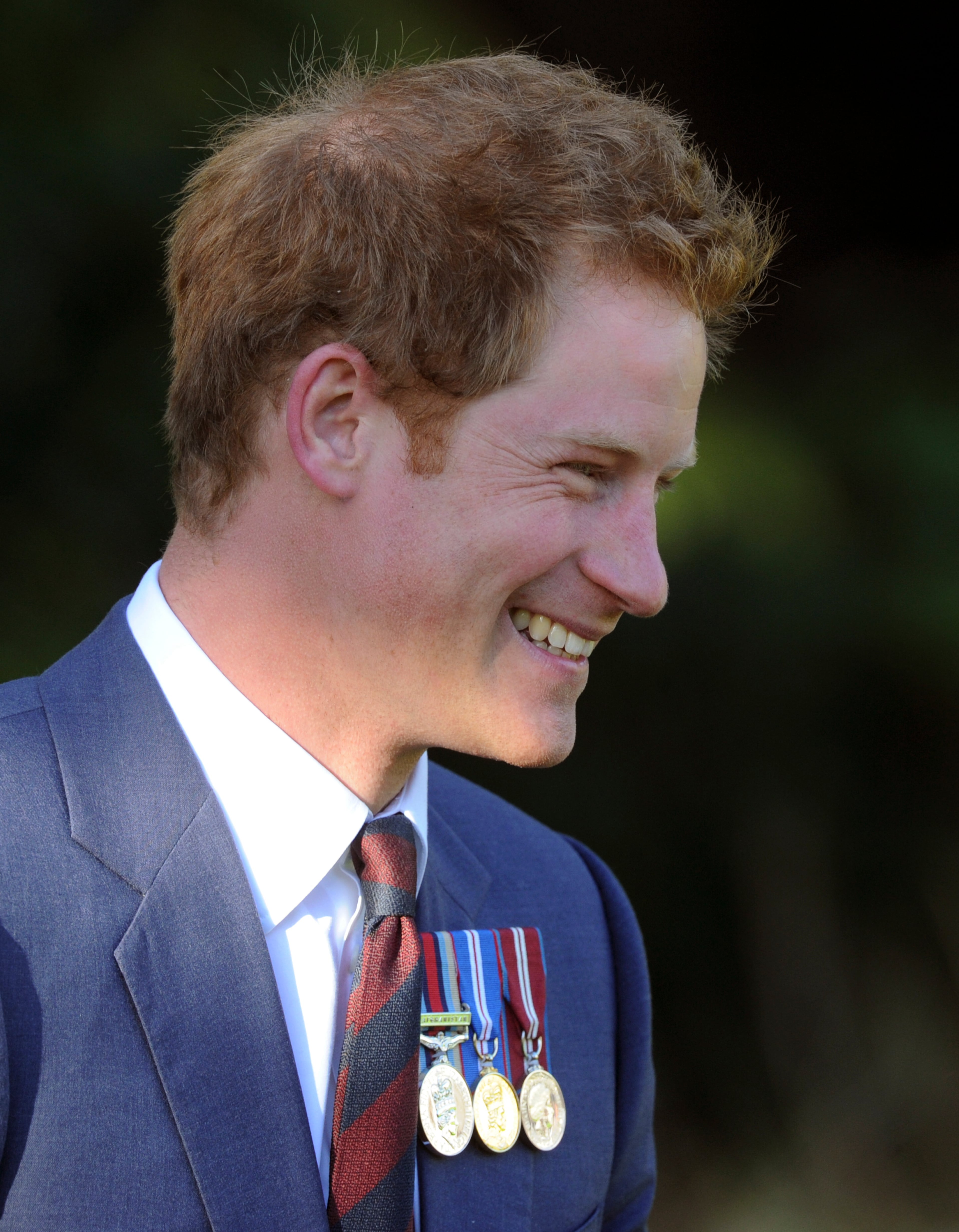 Britain's Prince Harry smiles as he attends a welcome ceremony at Government House in Wellington, New Zealand, on May 9, 2015.