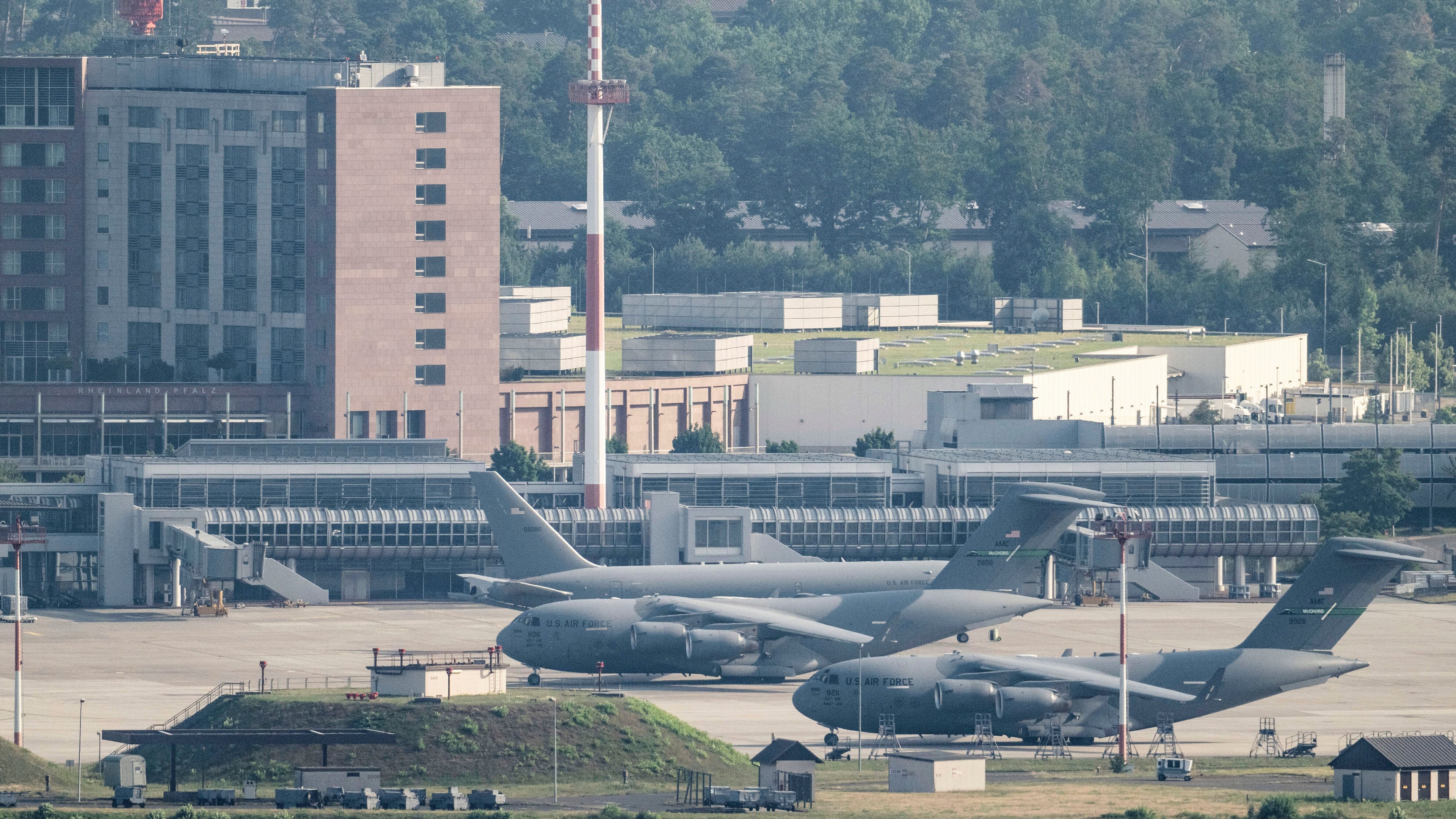 FILE - United States' Air Force transport aircrafts are seen on the tarmac at Ramstein U.S. air base, in Landstuhl, Germany, June 23, 2025. (Boris Roessler/dpa via AP, File)
