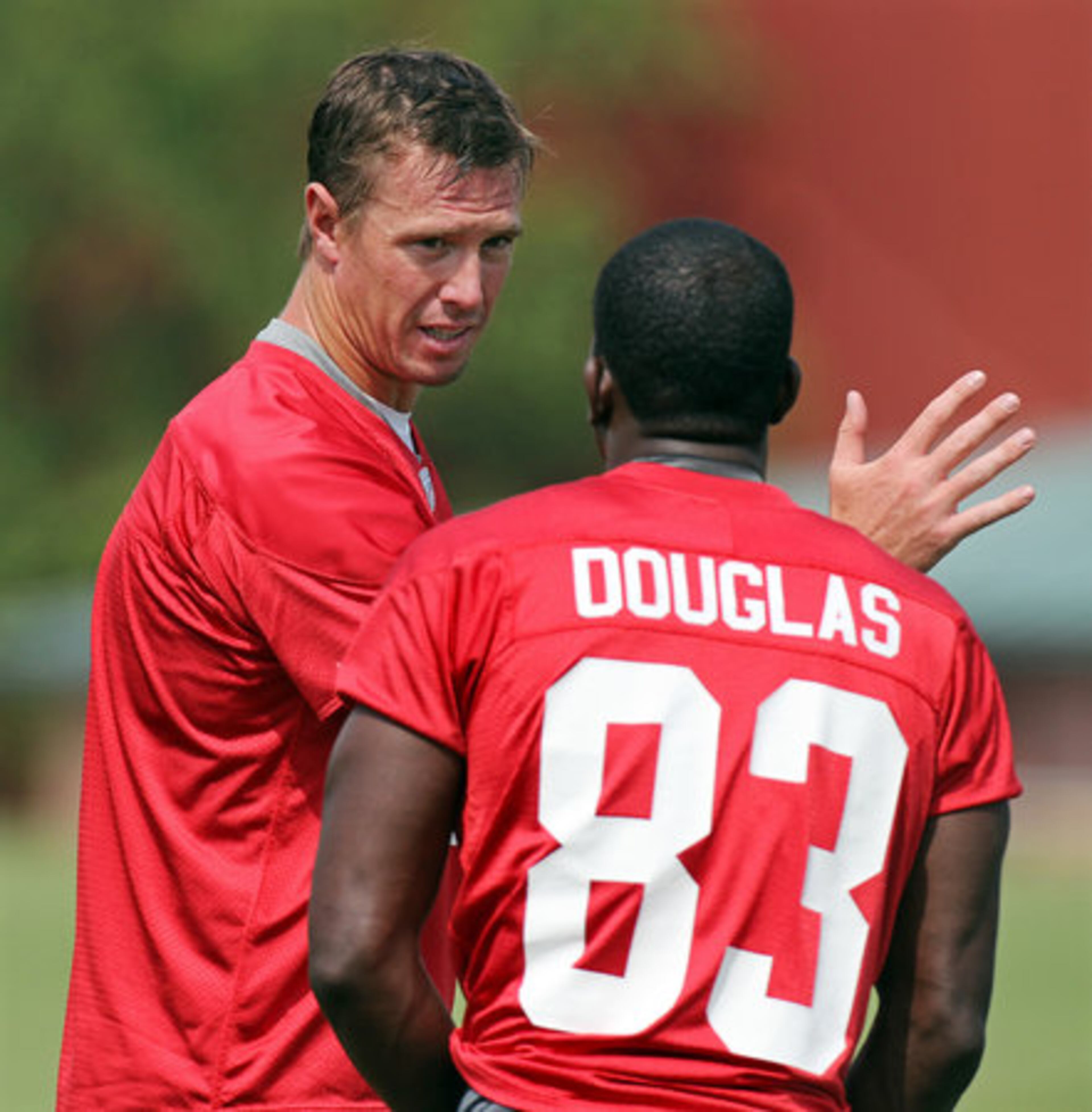 Falcons quarterback Matt Ryan and wide receiver Harry Douglas go over a route.