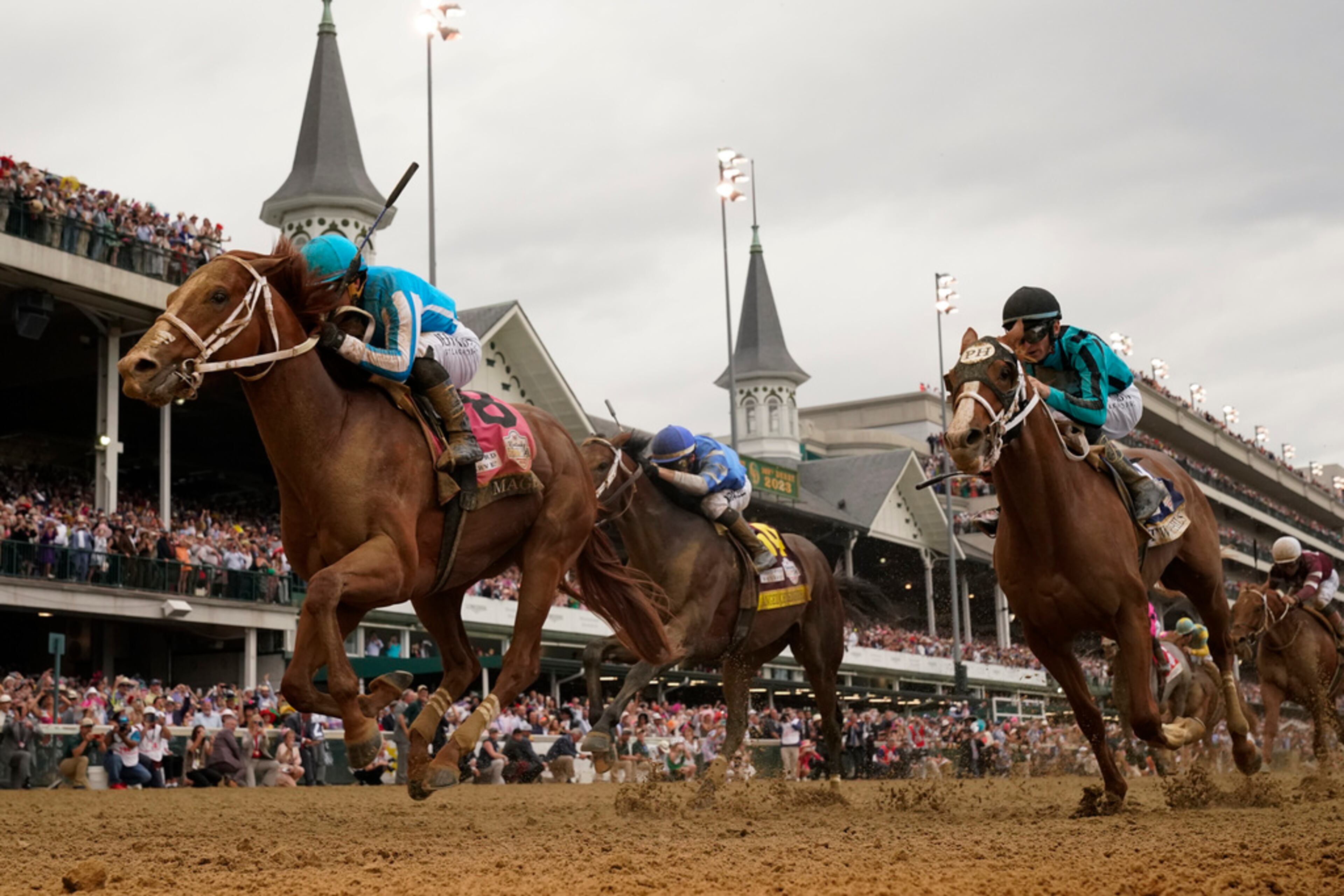 Mage (8), with Javier Castellano aboard, wins the 149th running of the Kentucky Derby horse race at Churchill Downs Saturday, May 6, 2023, in Louisville, Ky. (AP Photo/Jeff Roberson)