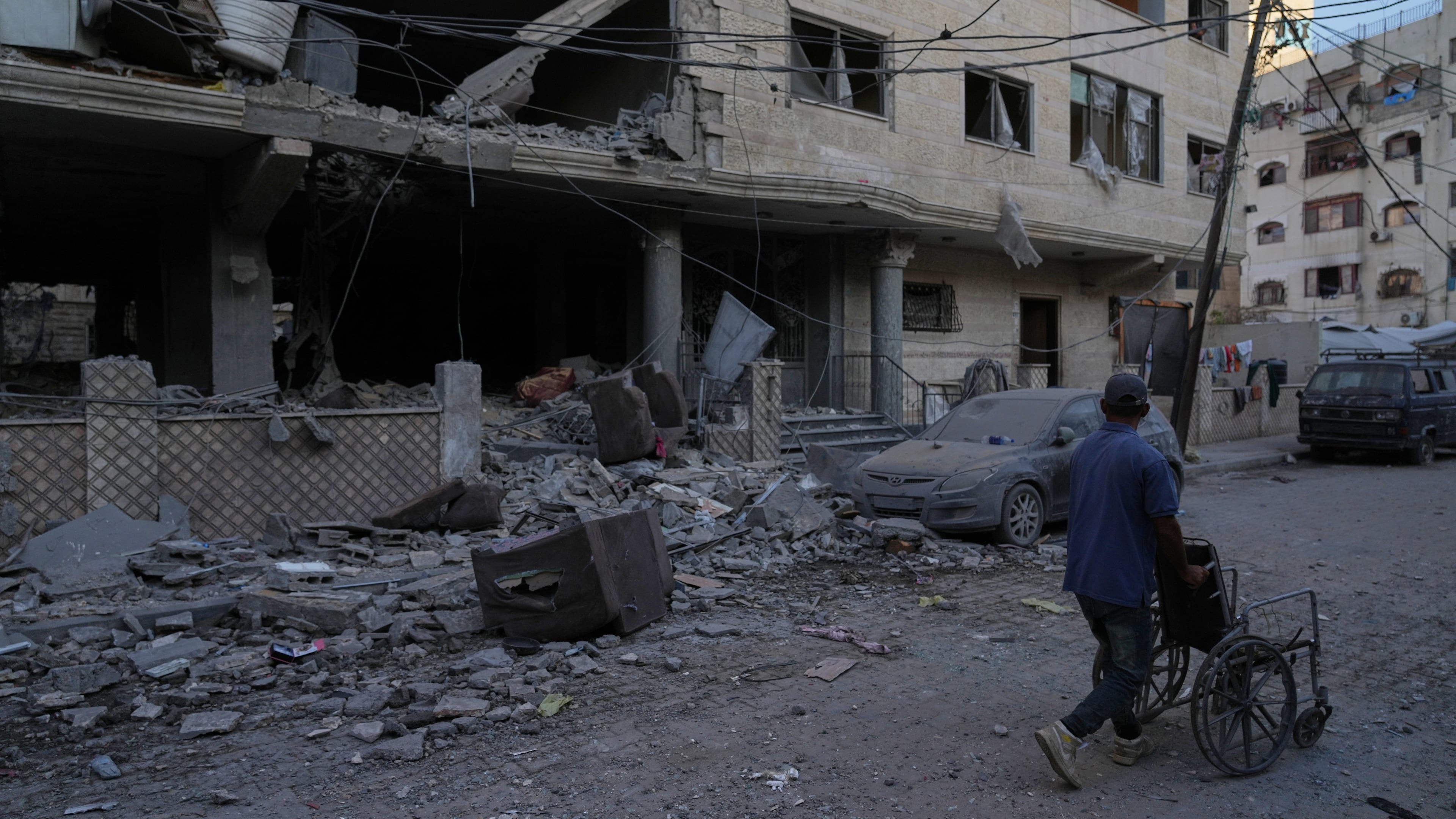 Palestinians inspect the site of an early morning Israeli airstrike in Gaza city, Saturday, Oct. 3, 2026. (AP Photo/Jehad Alshrafi)