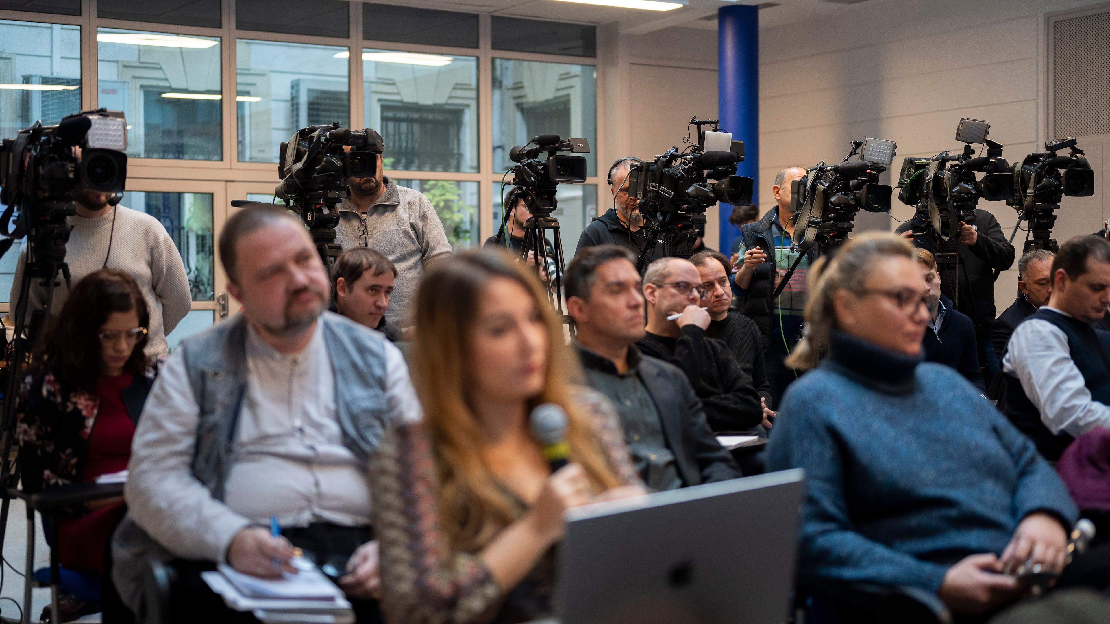 FILE - Members of the media work during the government's press conference on Thursday, Jan 18, 2024. In Hungary, Prime Minister Viktor Orbán has extended his party's control over the media, directly affecting informed democratic participation. (AP Photo/Denes Erdos, File)