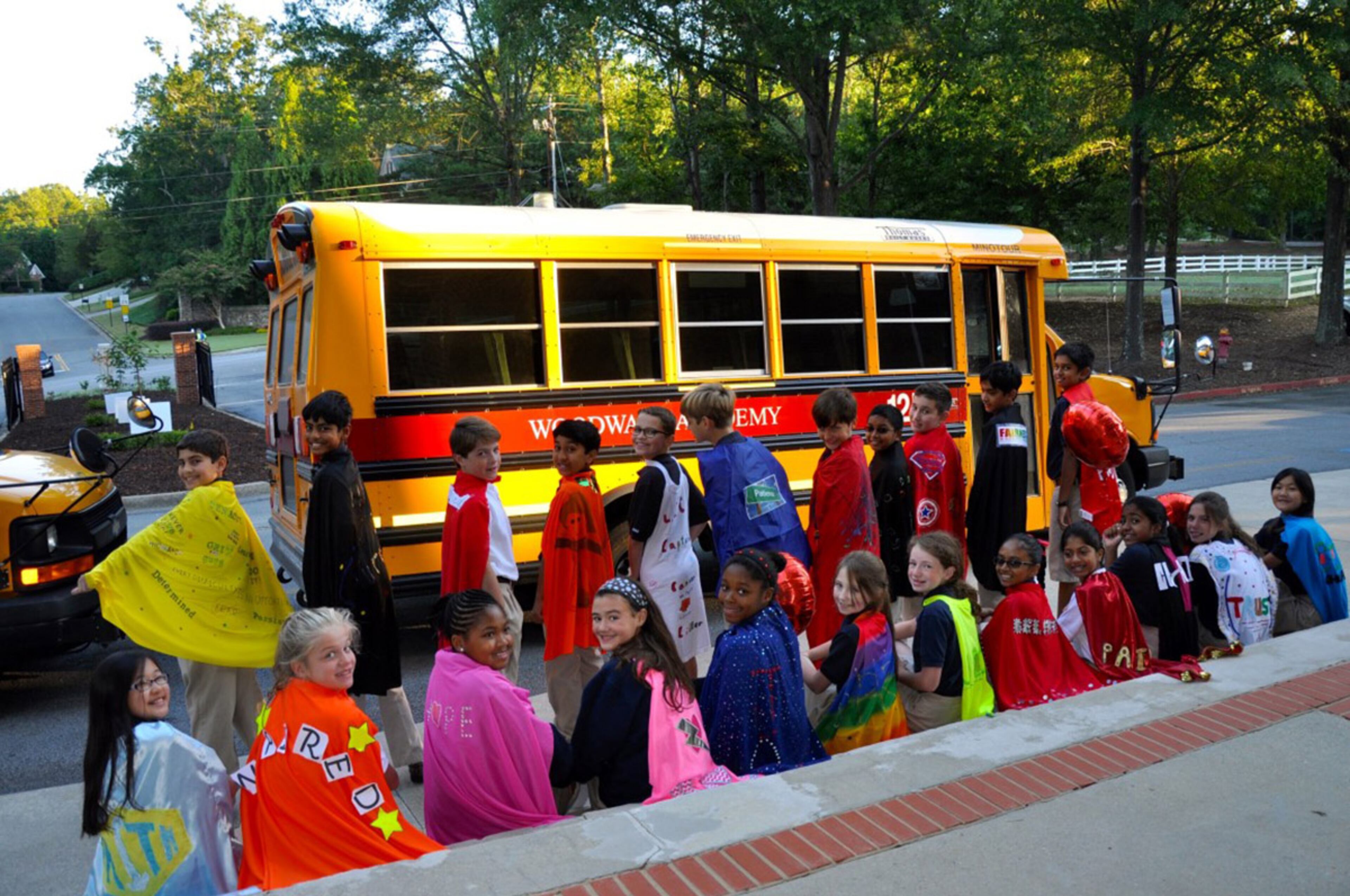 Woodward Academy’s Woodward North campus in Johns Creek showed its support for #CapeDayATL. These sixth-graders wore their capes to school Tuesday. Courtesy of Kristin Chapman