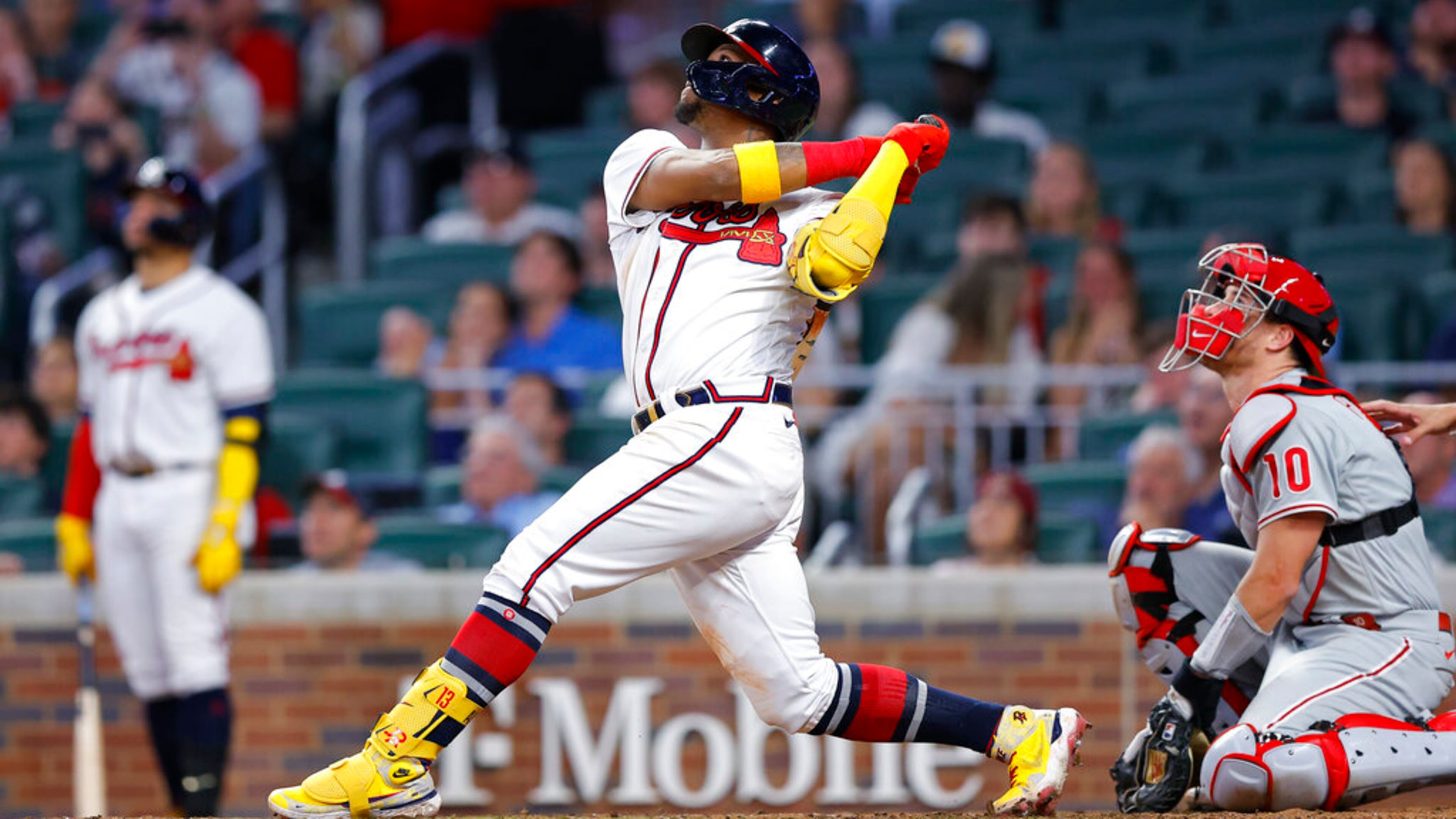 Atlanta Braves Ronald Acuna Jr. hits a sacrifice fly in the sixth inning of a baseball game against the Philadelphia Phillies, Tuesday, May 24, 2022, in Atlanta. (AP Photo/Todd Kirkland)