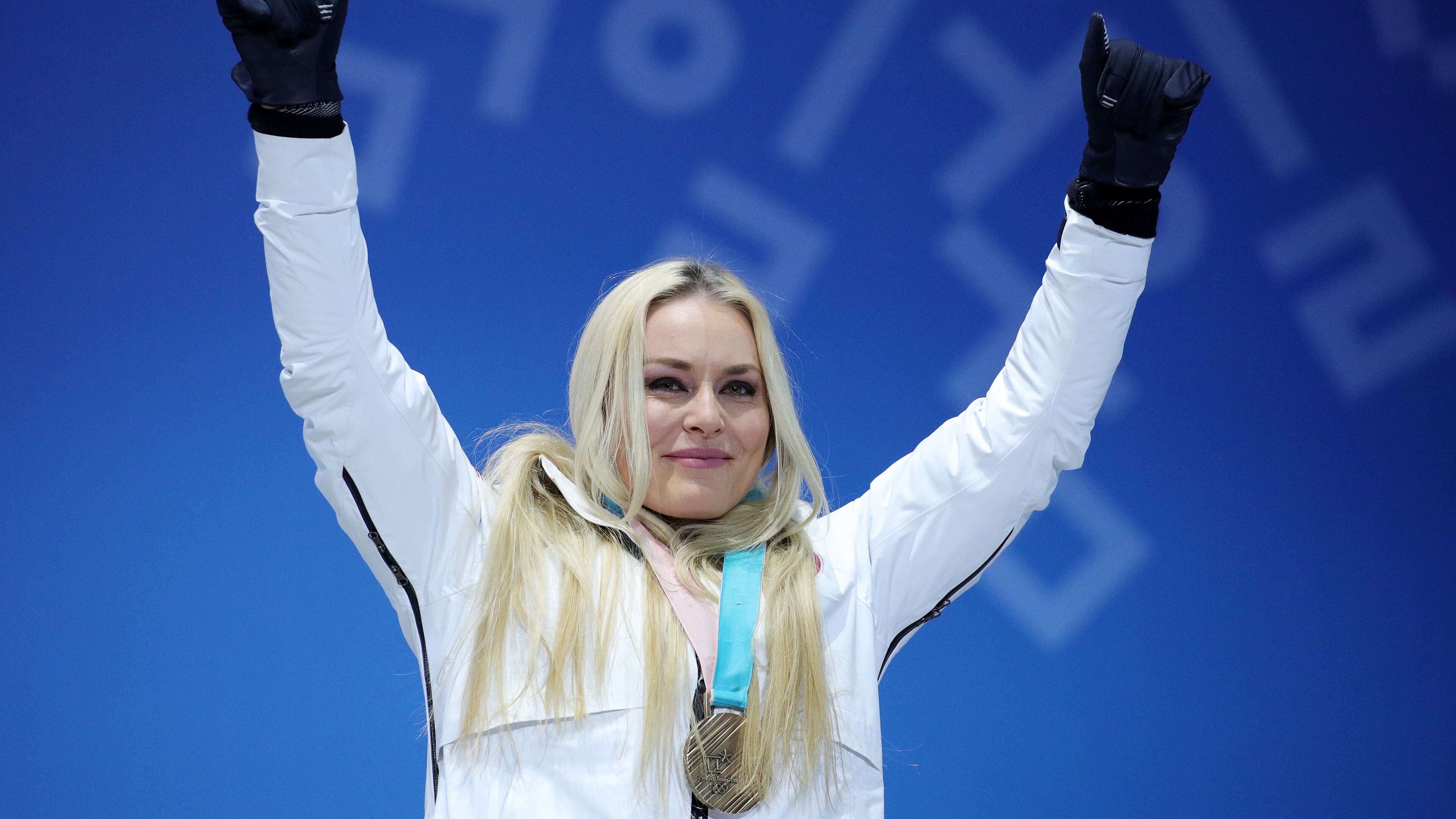PYEONGCHANG-GUN, SOUTH KOREA - FEBRUARY 21: Bronze medallist Lindsey Vonn of the United States celebrates during the medal ceremony for the Ladies' Downhill on day twelve of the PyeongChang 2018 Winter Olympic Games at Medal Plaza on February 21, 2018 in Pyeongchang-gun, South Korea. (Photo by Andreas Rentz/Getty Images)