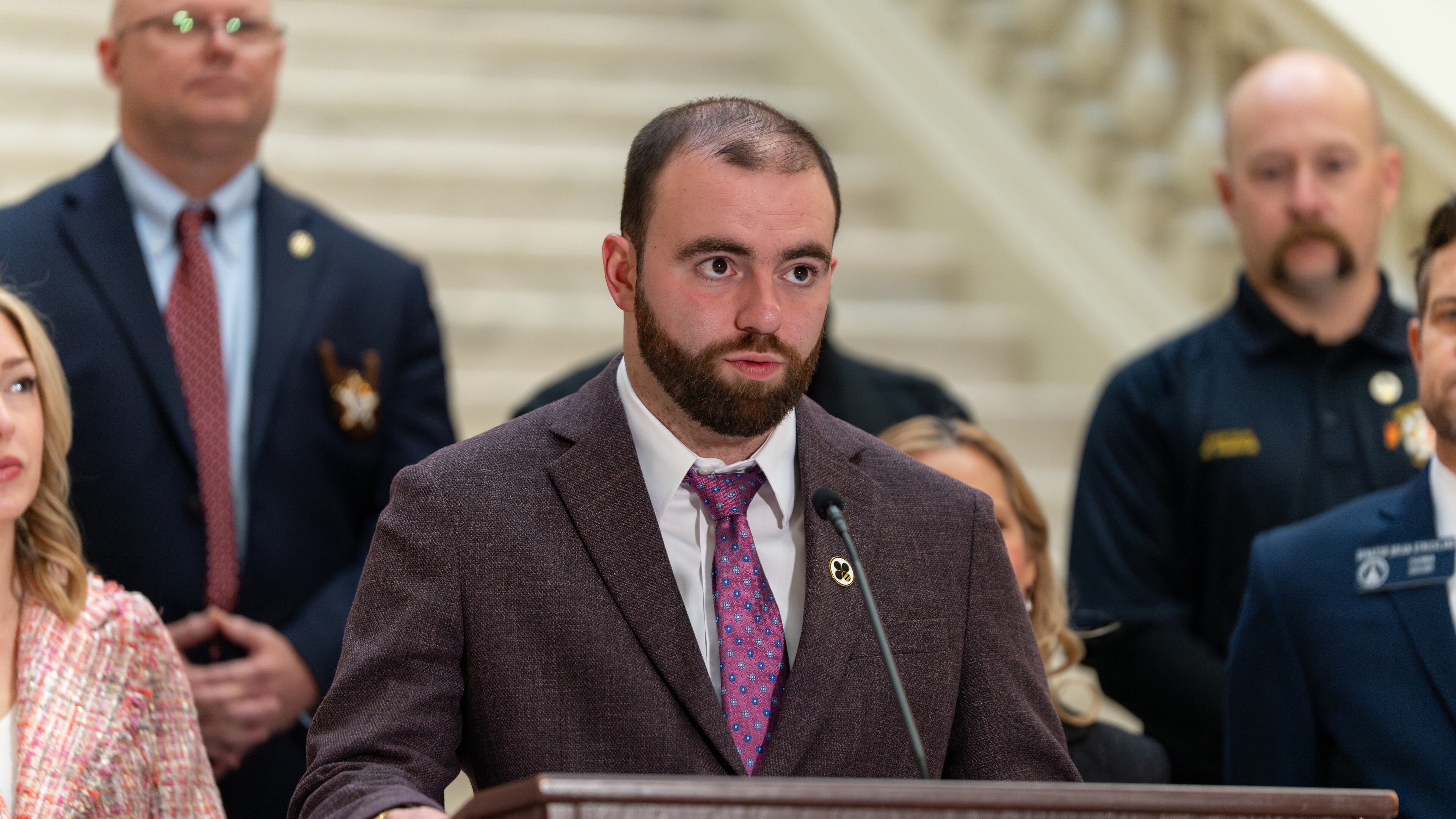 "Love On The Spectrum" star Connor Tomlinson advocates for Senate Bill 433, also known as Rio’s Law on Thursday, Jan 29, 2026. The bill would create specialty license plates and provide law enforcement with training focused on autism awareness. (Ben Hendren for the AJC)