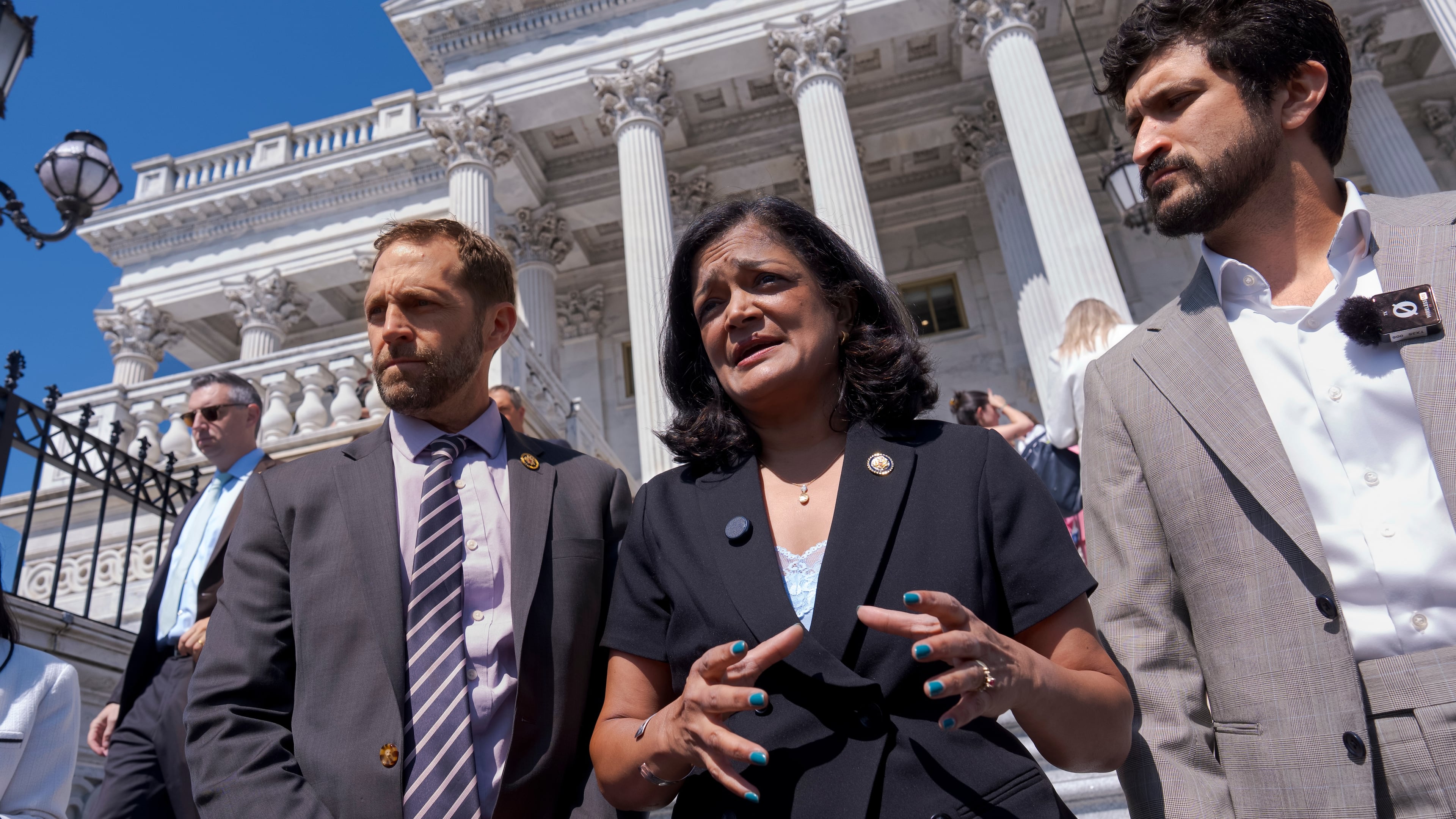 From left, Rep. Jason Crow, D-Colo., Rep. Pramila Jayapal, D-Wash., and Rep. Greg Casar, D-Texas, talk to reporters just after the House narrowly passed a resolution to halt U.S. military action in Iran, at the Capitol in Washington, Thursday, July 23, 2026. (AP Photo/J. Scott Applewhite)