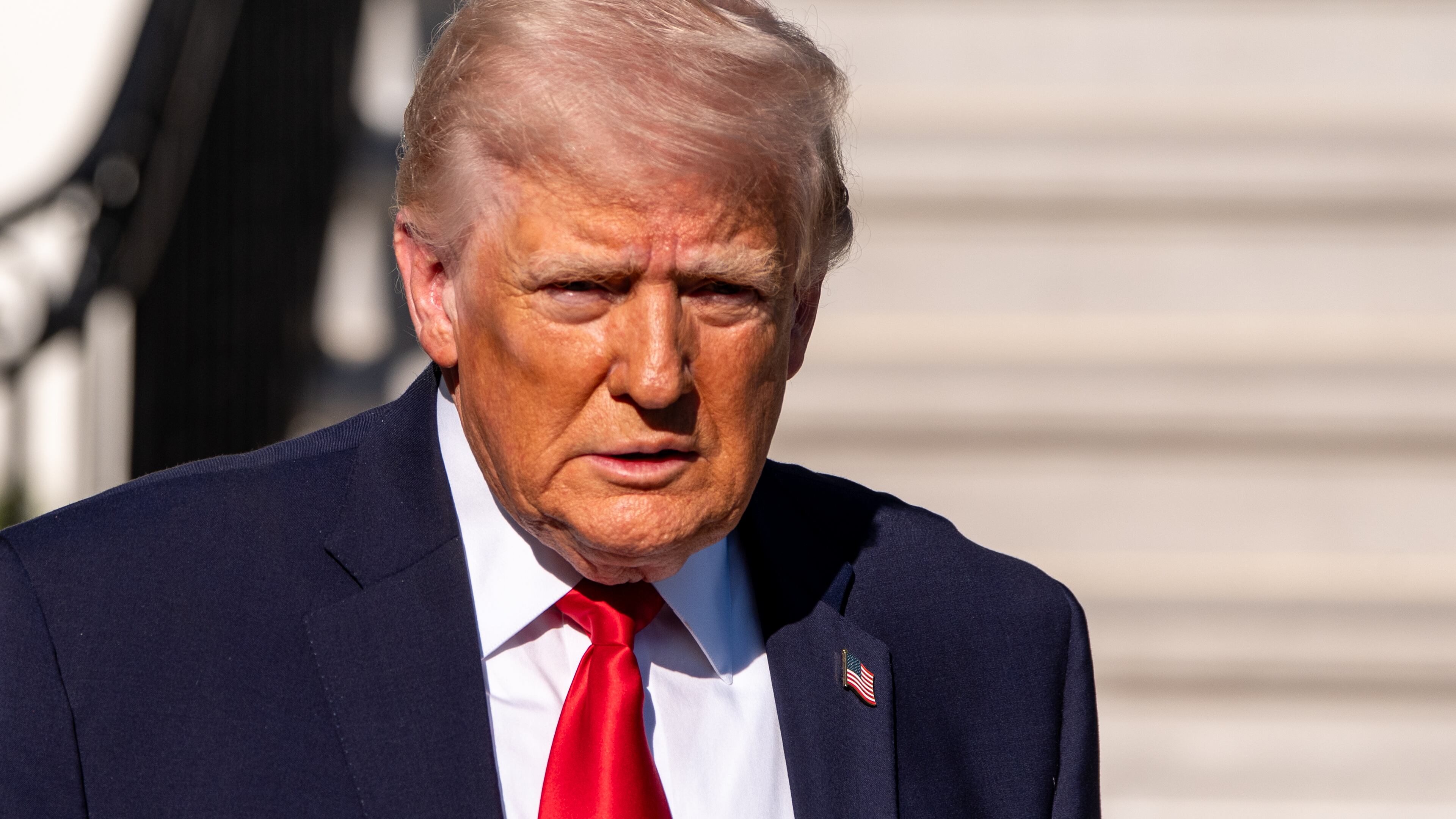 President Donald Trump speaks with reporters before departing on Marine One from the South Lawn of the White House, Saturday, April 11, 2026, in Washington. (AP Photo/Alex Brandon)