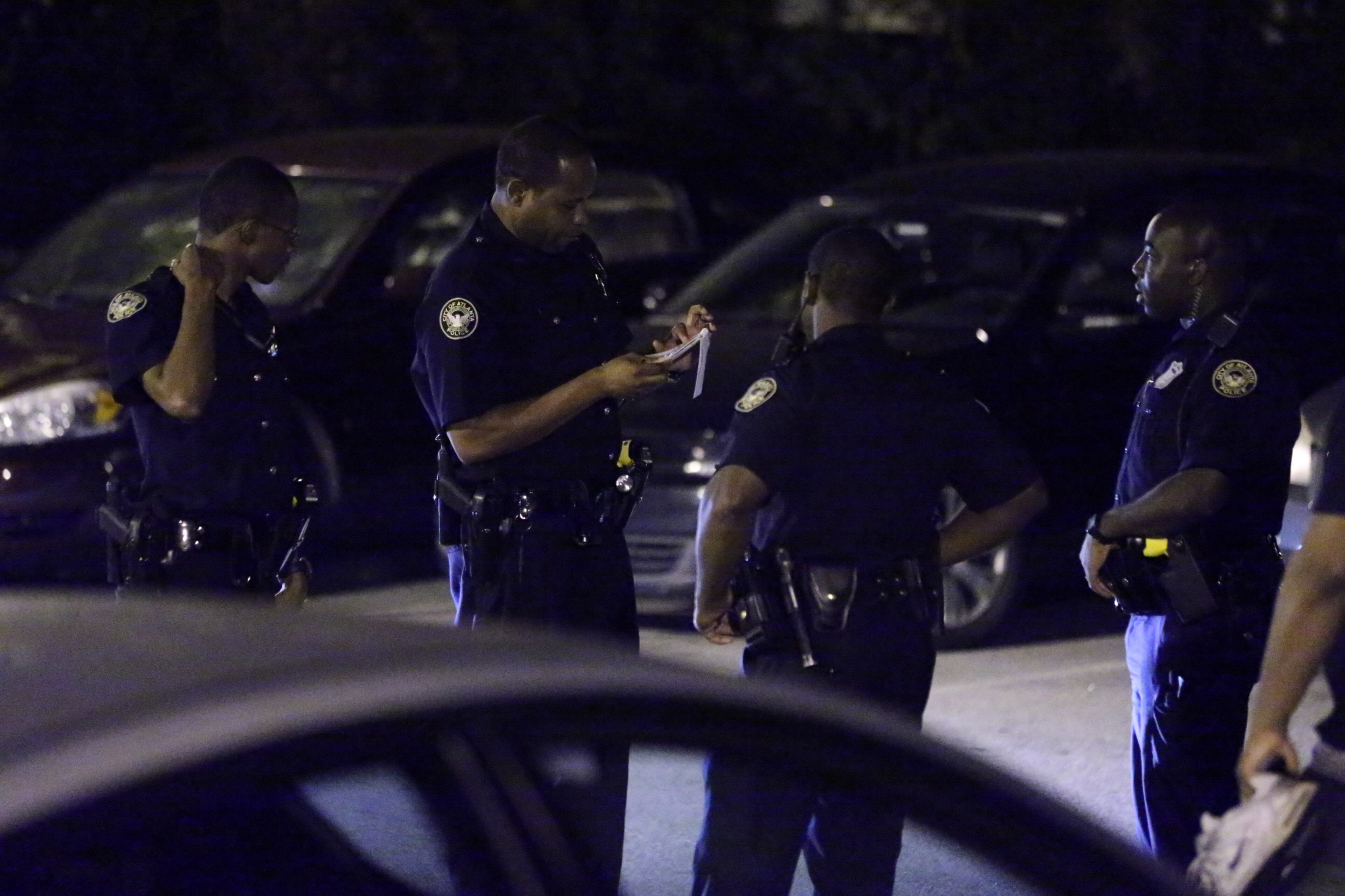 Only a handful of the 30 or so cars in the lot were left untouched by the overnight thieves, according to Clements, who said items stolen included an iPad, money and shoes. JOHN SPINK / JSPINK@AJC.COM