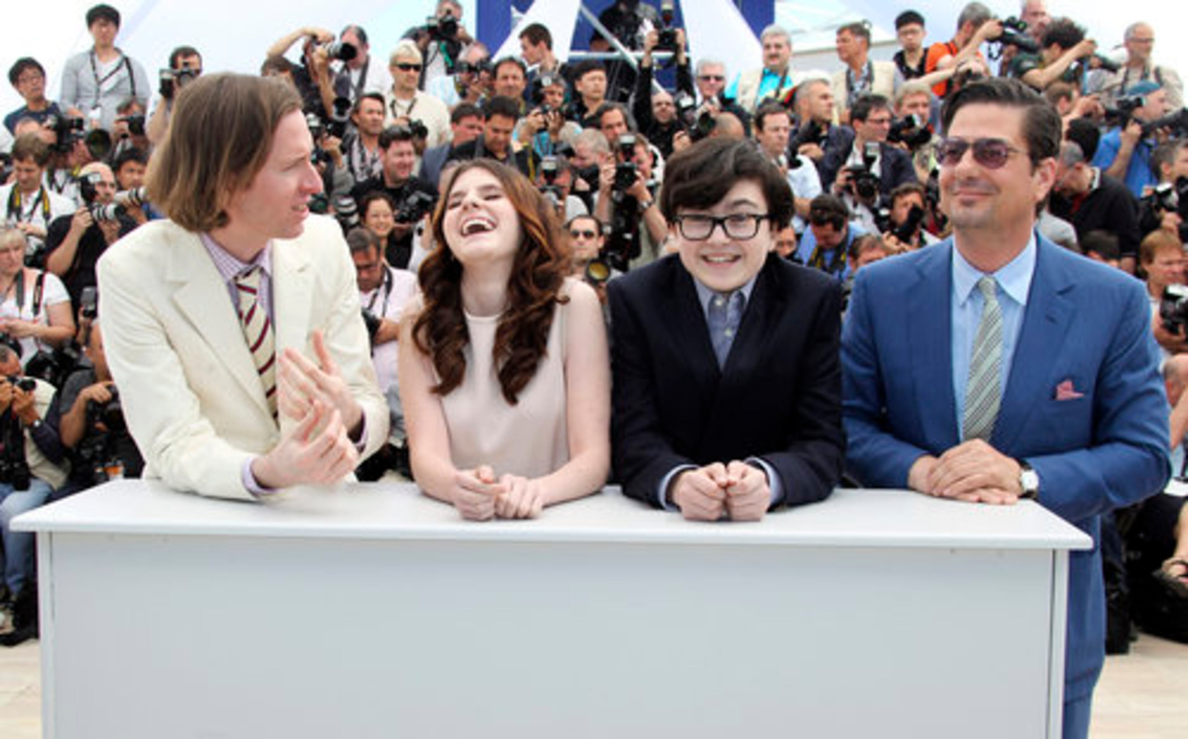 "Moonrise Kingdom" director Wes Anderson (from left), young actors Kara Hayward, Jared Gilman and screenwriter Roman Coppola enjoy a laugh as the cameras click away.