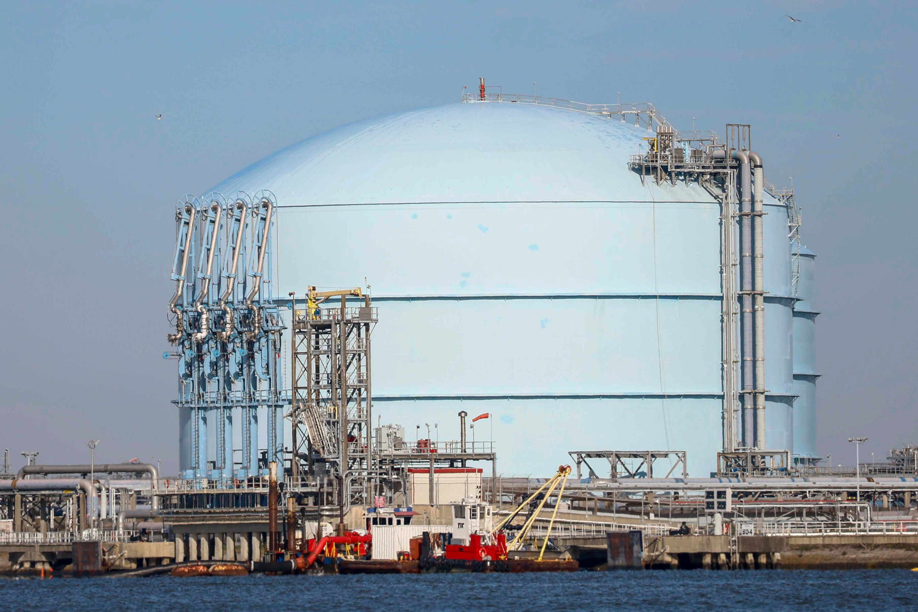One of the Southern LNG Company’s liquefied natural gas tanks is shown from the Savannah River. (Miguel Martinez/AJC)