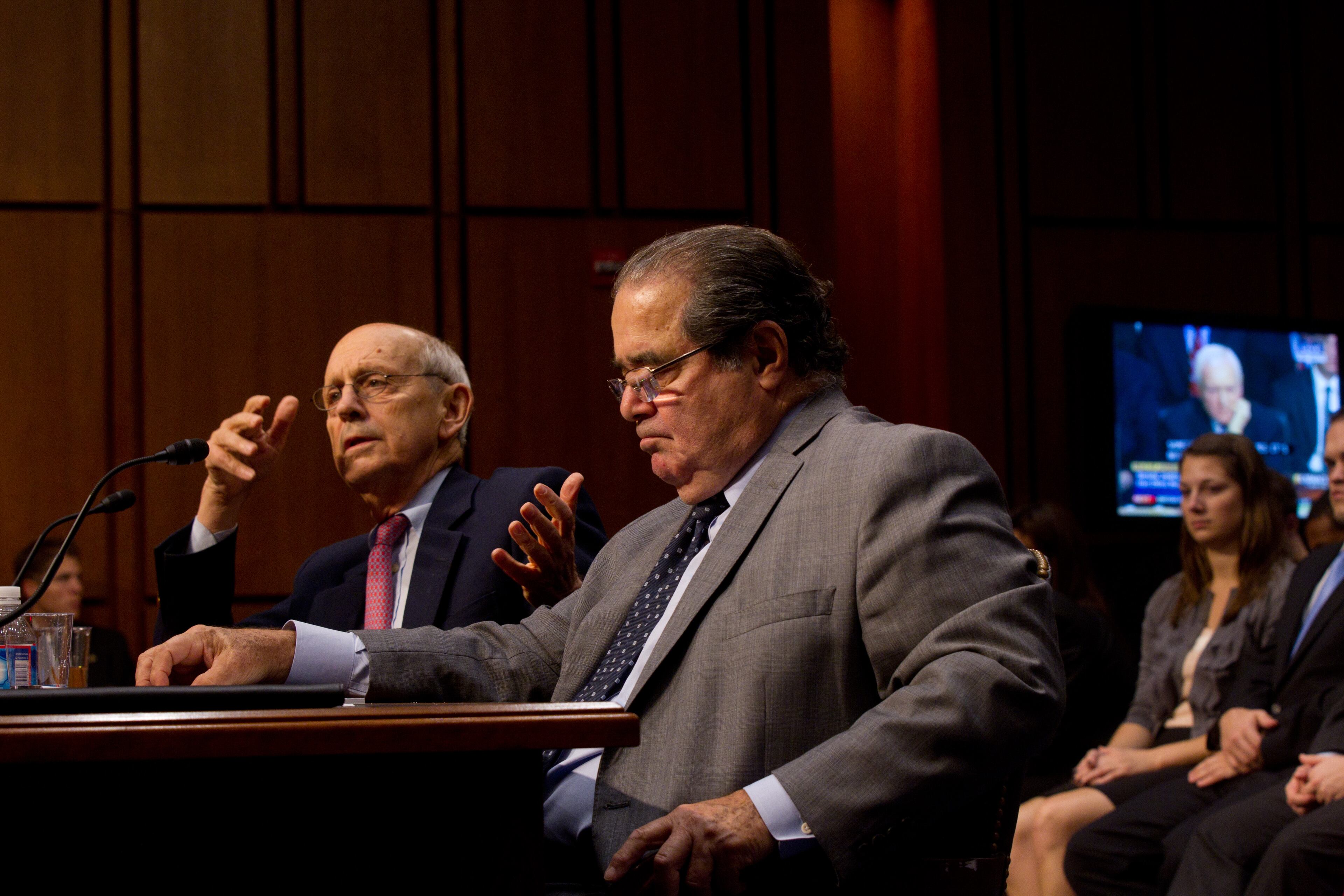 Supreme Court Justices Antonin Scalia, right, and Stephen Breyer testify before the Senate Judiciary Committee, on Capitol Hill in Washington, Oct. 5, 2011. Scalia, whose transformative legal theories, vivid writing and outsize personality made him a leader of a conservative intellectual renaissance in his three decades on the Supreme Court, died on Feb. 13, 2016. He was 79. (Philip Scott Andrews/The New York Times)