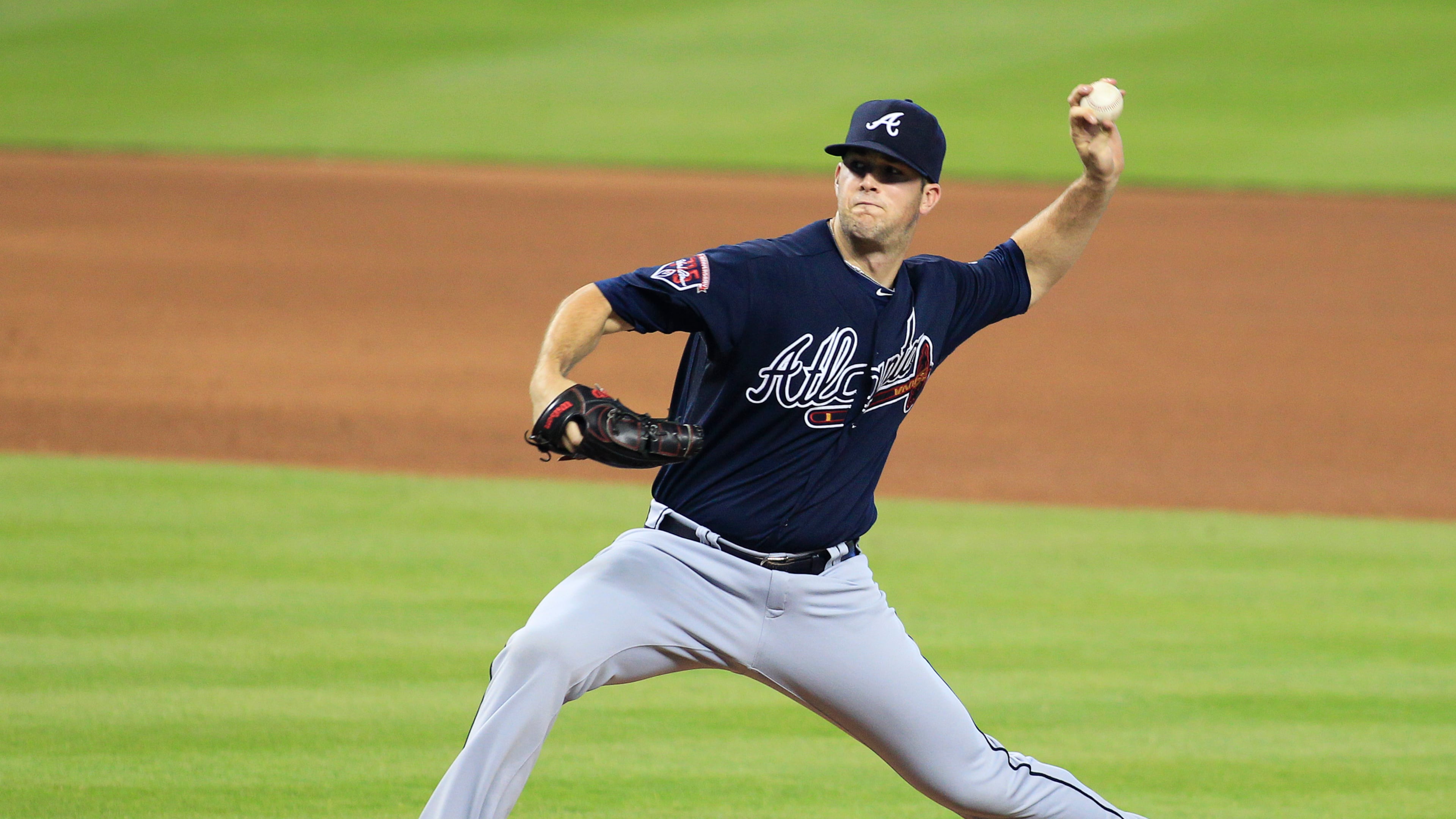 Atlanta Braves pitcher Alex Wood throws in the eighth inning against the Miami Marlins during their baseball game in Miami, Sunday, June 1, 2014. (AP Photo/Joe Skipper)