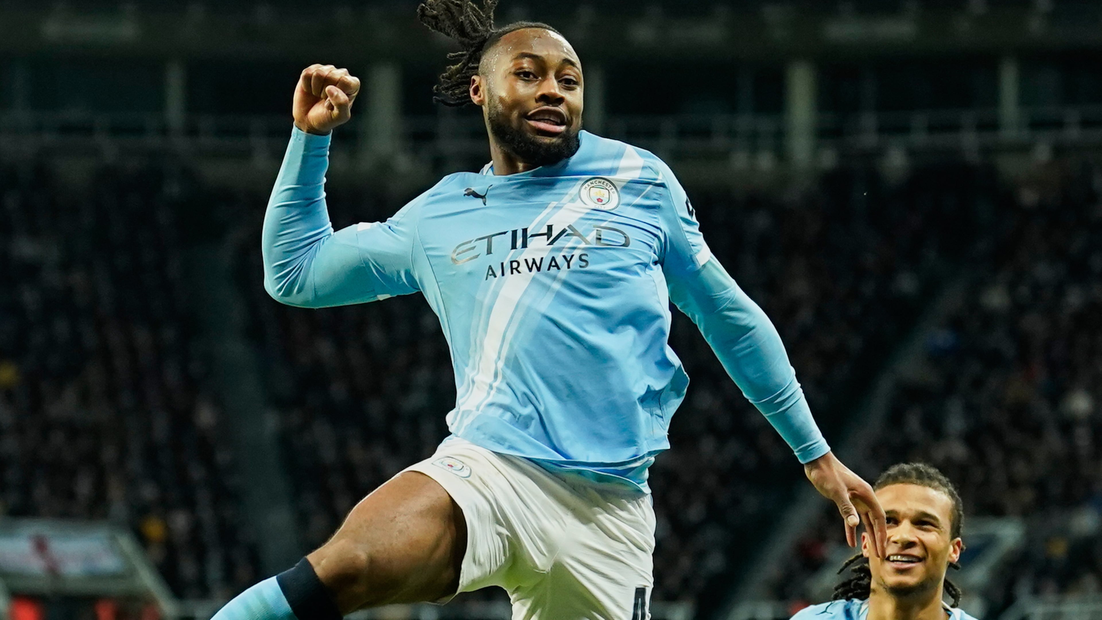Manchester City's Antoine Semenyo, left, celebrates a goal that was later disallowed by a VAR decision during the English League Cup semifinal first leg soccer match between Newcastle and Manchester City in Newcastle, England, Tuesday, Jan. 13, 2026. (AP Photo/Dave Thompson)