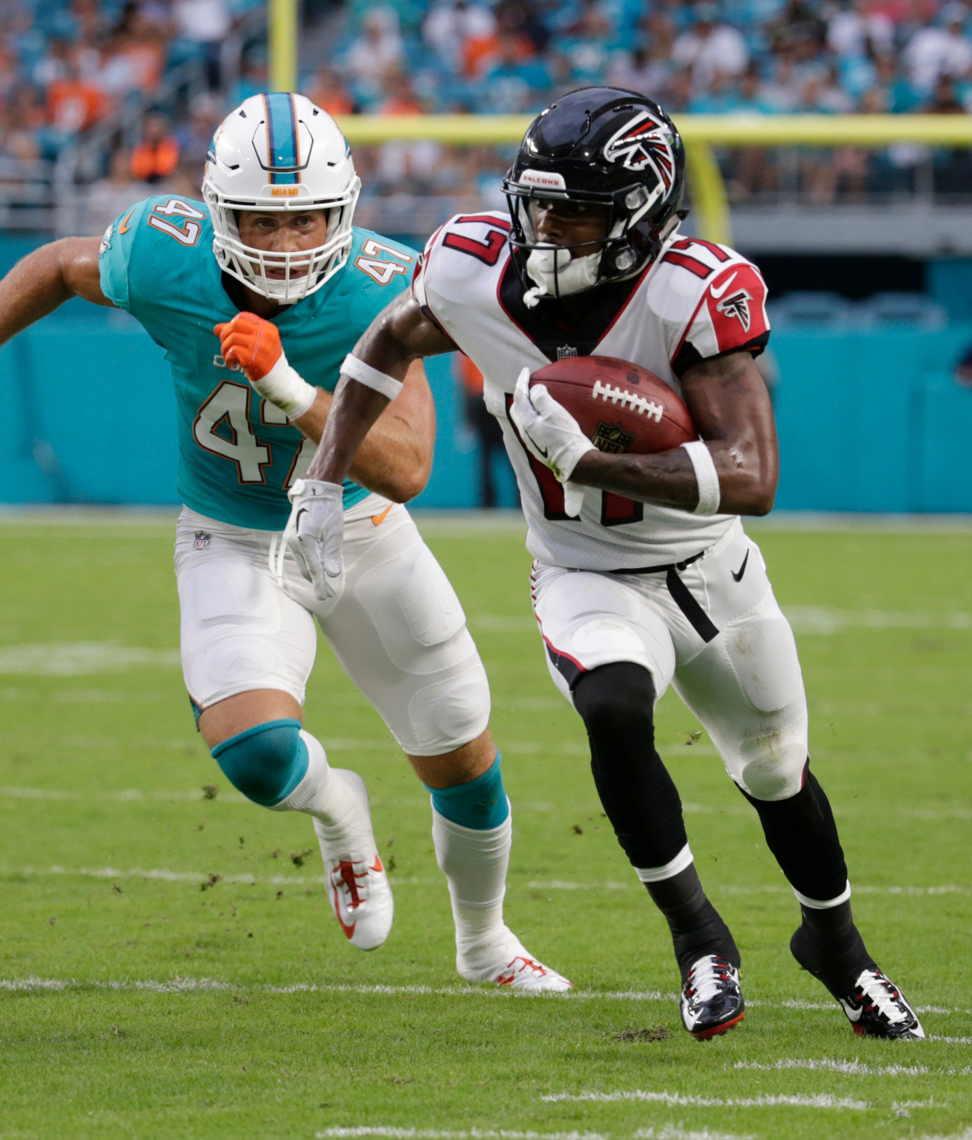 Miami Dolphins middle linebacker Kiko Alonso (47) runs after Atlanta Falcons wide receiver Marvin Hall (17), during the first half of an NFL preseason football game, Thursday, Aug. 10, 2017, in Miami Gardens, Fla. (AP Photo/Lynne Sladky)