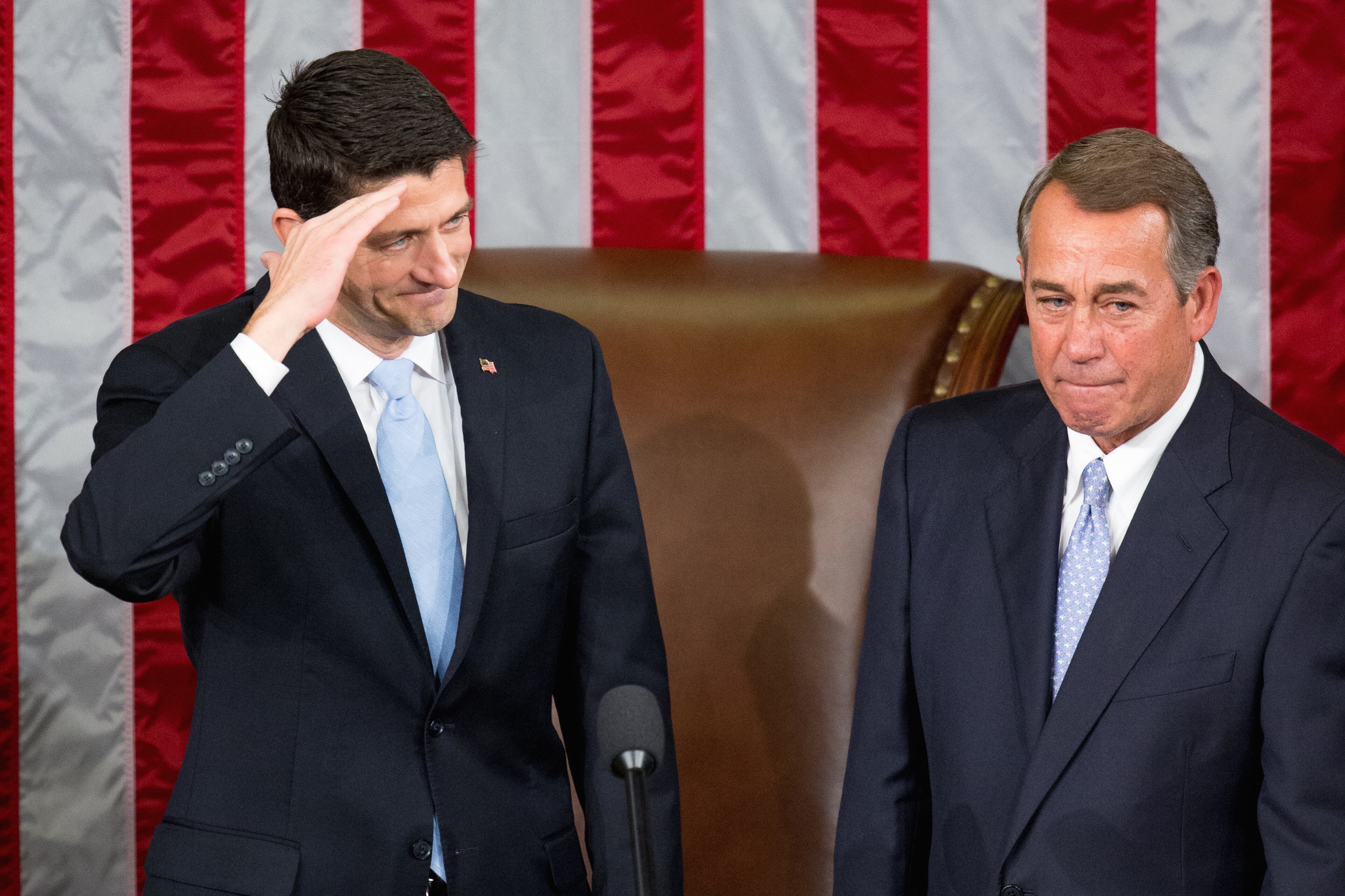 House Speaker John Boehner stands with his successor Rep. Paul Ryan, R-Wis., left, in the House Chamber on Capitol Hill in Washington, Thursday, Oct. 29, 2015. Republicans rallied behind Ryan to elect him the House's 54th speaker on Thursday as a splintered GOP turned to the youthful but battle-tested lawmaker to mend its self-inflicted wounds and craft a conservative message to woo voters in next year's elections. (AP Photo/Andrew Harnik)