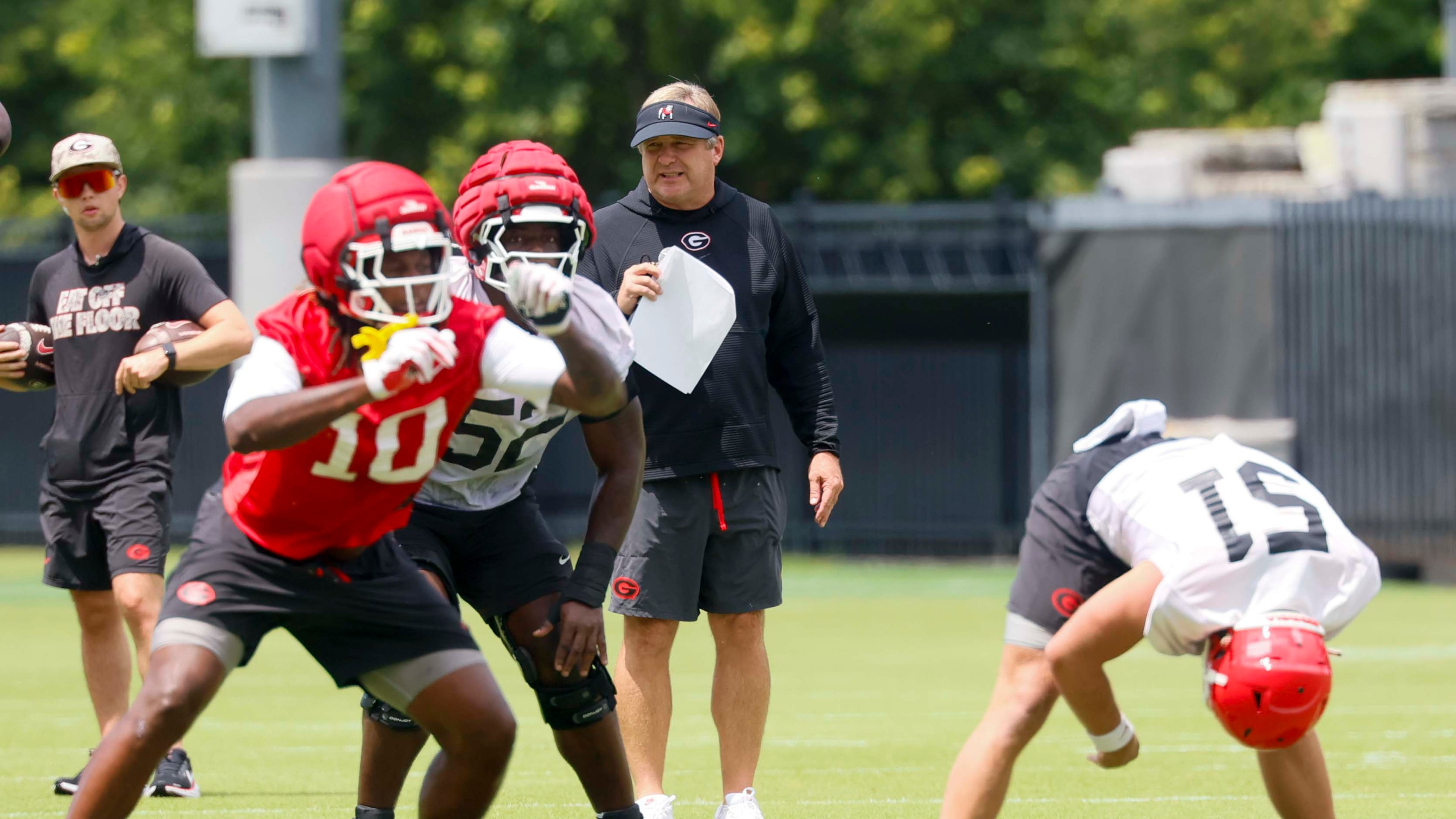 Georgia coach Kirby Smart observes his team during its first football practice Wednesday, Aug. 5, 2026, in Athens. (Miguel Martinez/AJC)