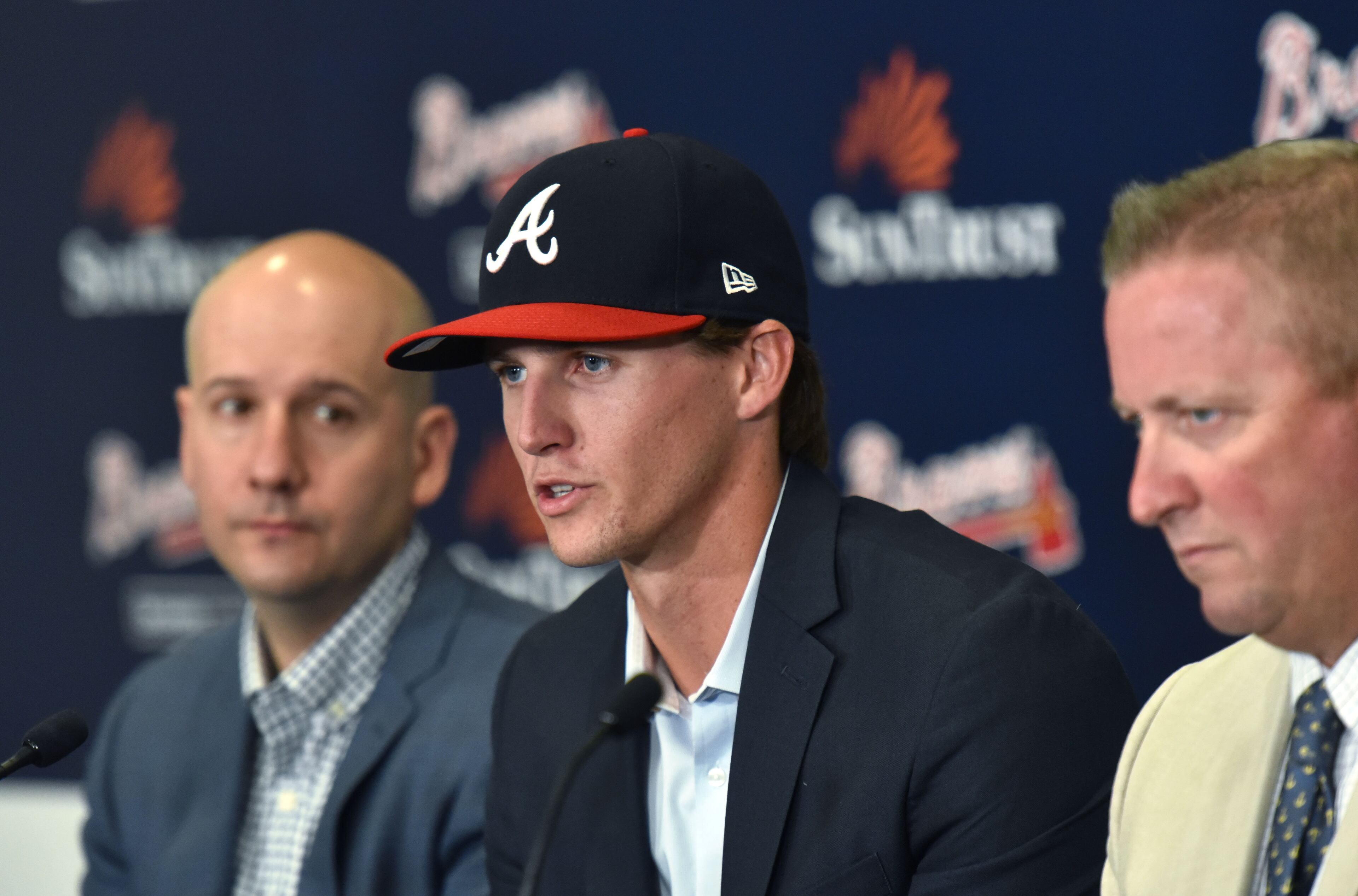 June 16, 2017 Atlanta - Kyle Wright (center) speaks as General Manager John Coppolella (left) and Braves scouting director Brian Bridges sit next him during a press conference at SunTrust Park on Friday, June 16, 2017. The Atlanta Braves today agreed to terms with RHP Kyle Wright, the club's first-round selection in the 2017 First-Year Player Draft. HYOSUB SHIN / HSHIN@AJC.COM