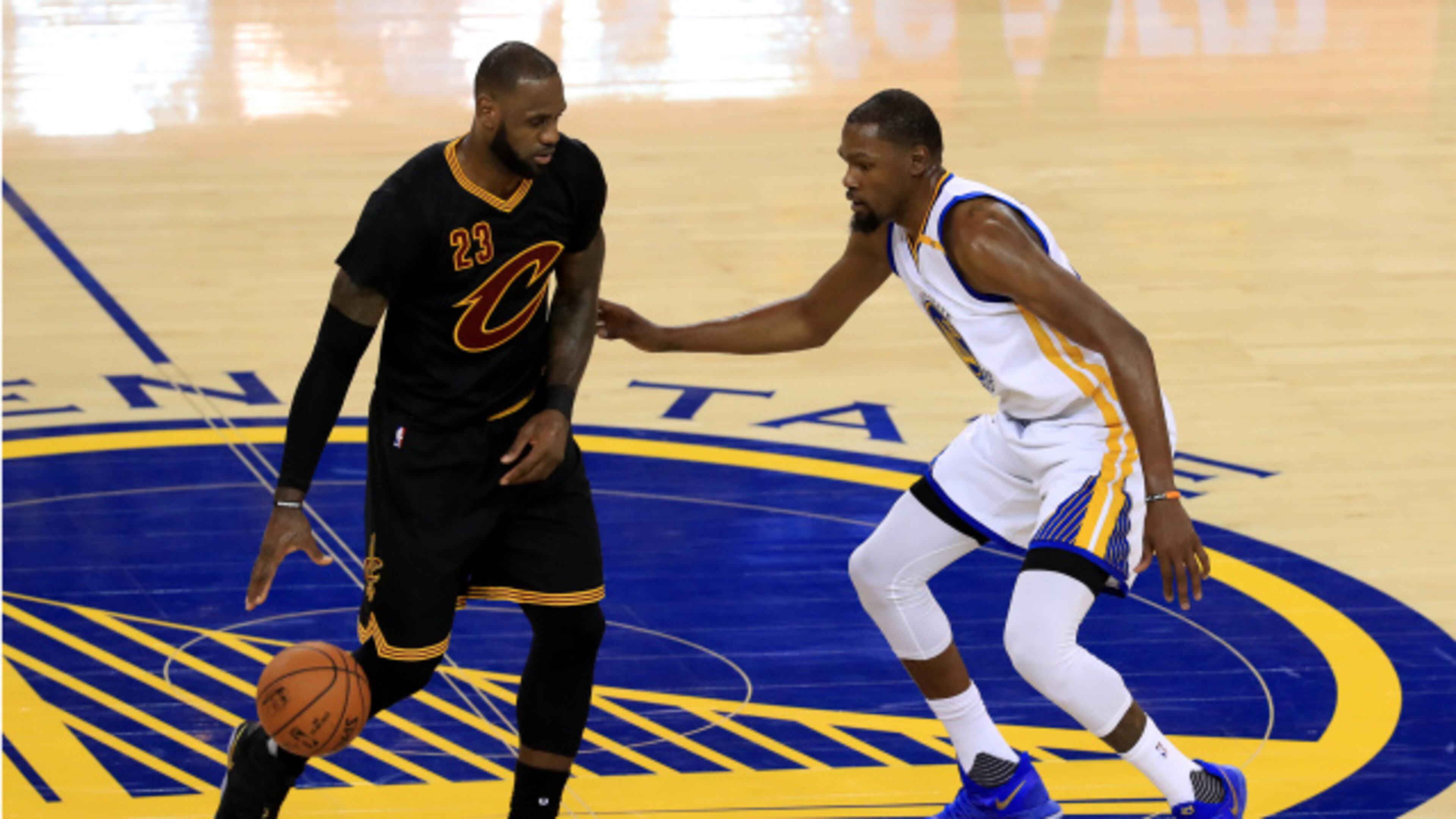 LeBron James of the Cleveland Cavaliers is defended by Kevin Durant of the Golden State Warriors during the second half of Game 2 of the 2017 NBA Finals at ORACLE Arena on June 4, 2017 in Oakland, California. (Photo by Ronald Martinez/Getty Images)