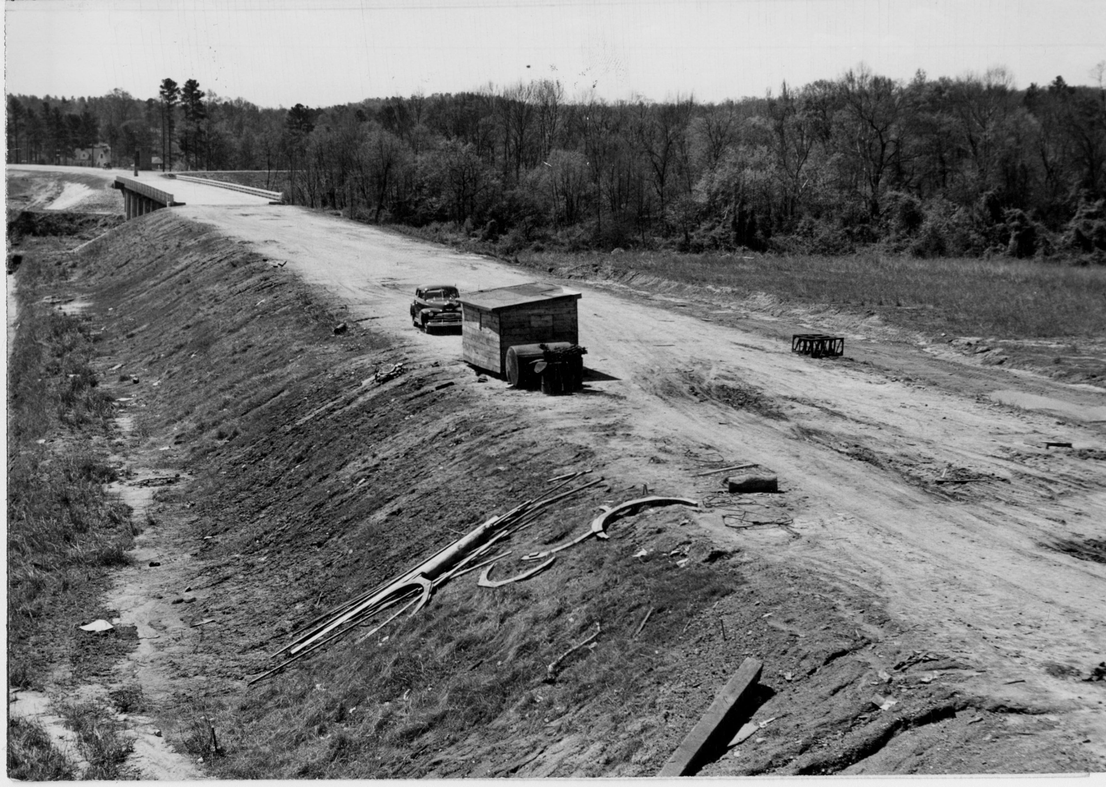 April 1951 - New bridge across the Chattahoochee River is nearing completion. Four-lane stretch of new highway to Marietta will end at this point. (Sandy Sanders
