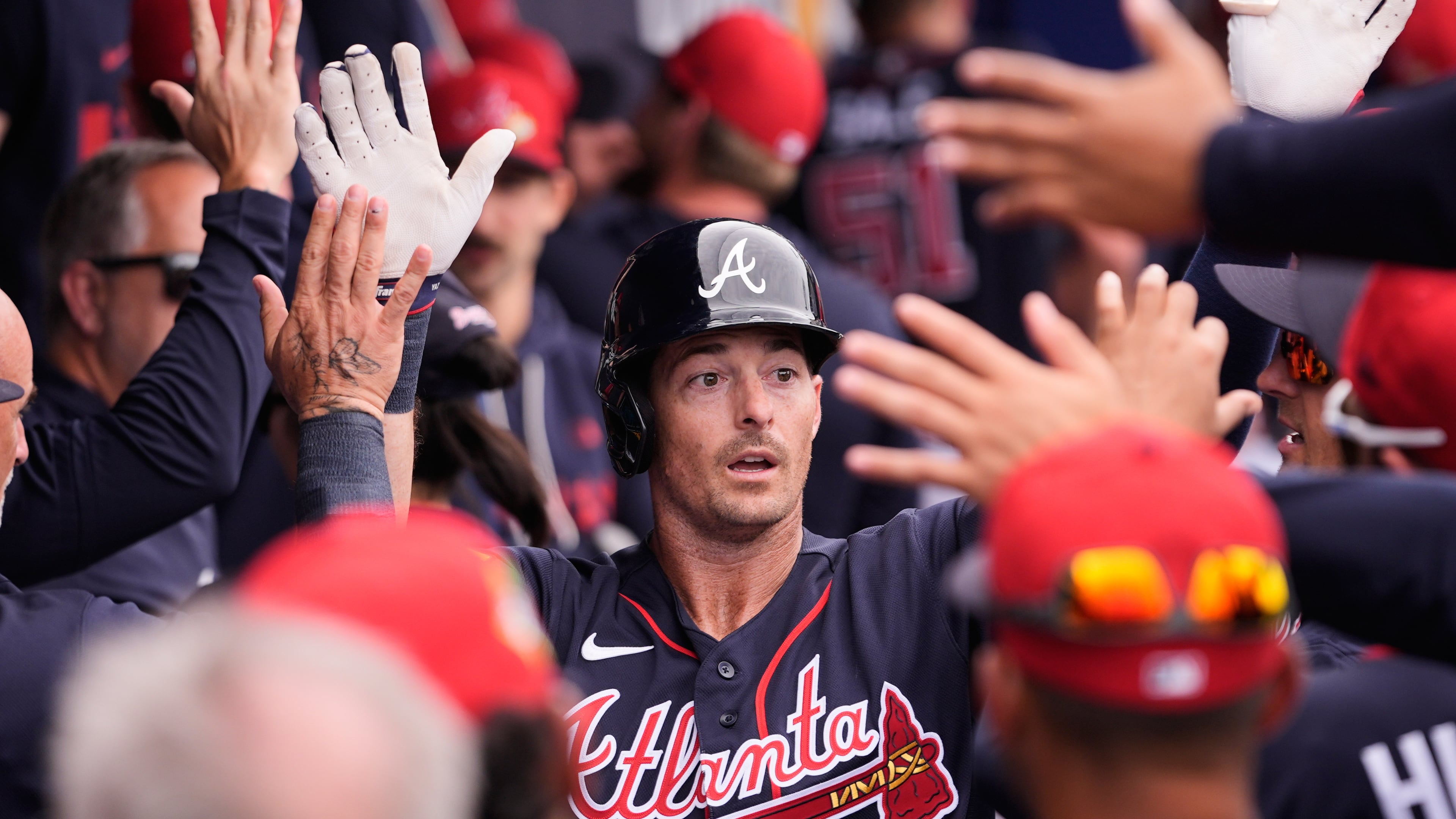Atlanta Braves outfielder Mike Yastrzemski celebrates his first of two solo homers during a spring training game against the Boston Red Sox on Friday, Feb. 27, 2026, in North Port, Fla. Yastrzemski took a two-year contract with the Braves in December. (Gerald Herbert/AP)