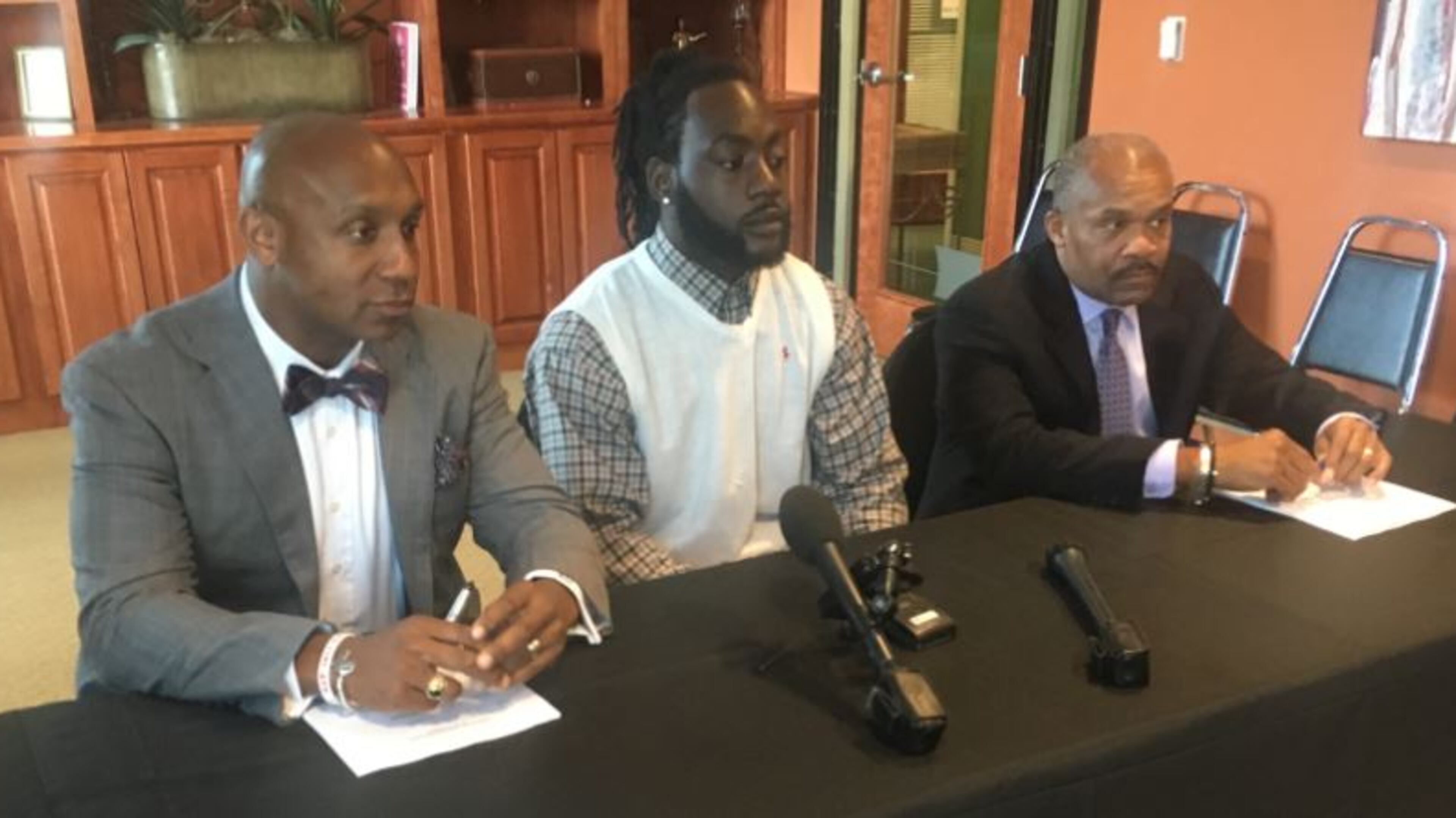 William Henry Miller, center, is suing Hapeville police following his wrongful arrest last year. Credit: Davis Bozeman Law Firm