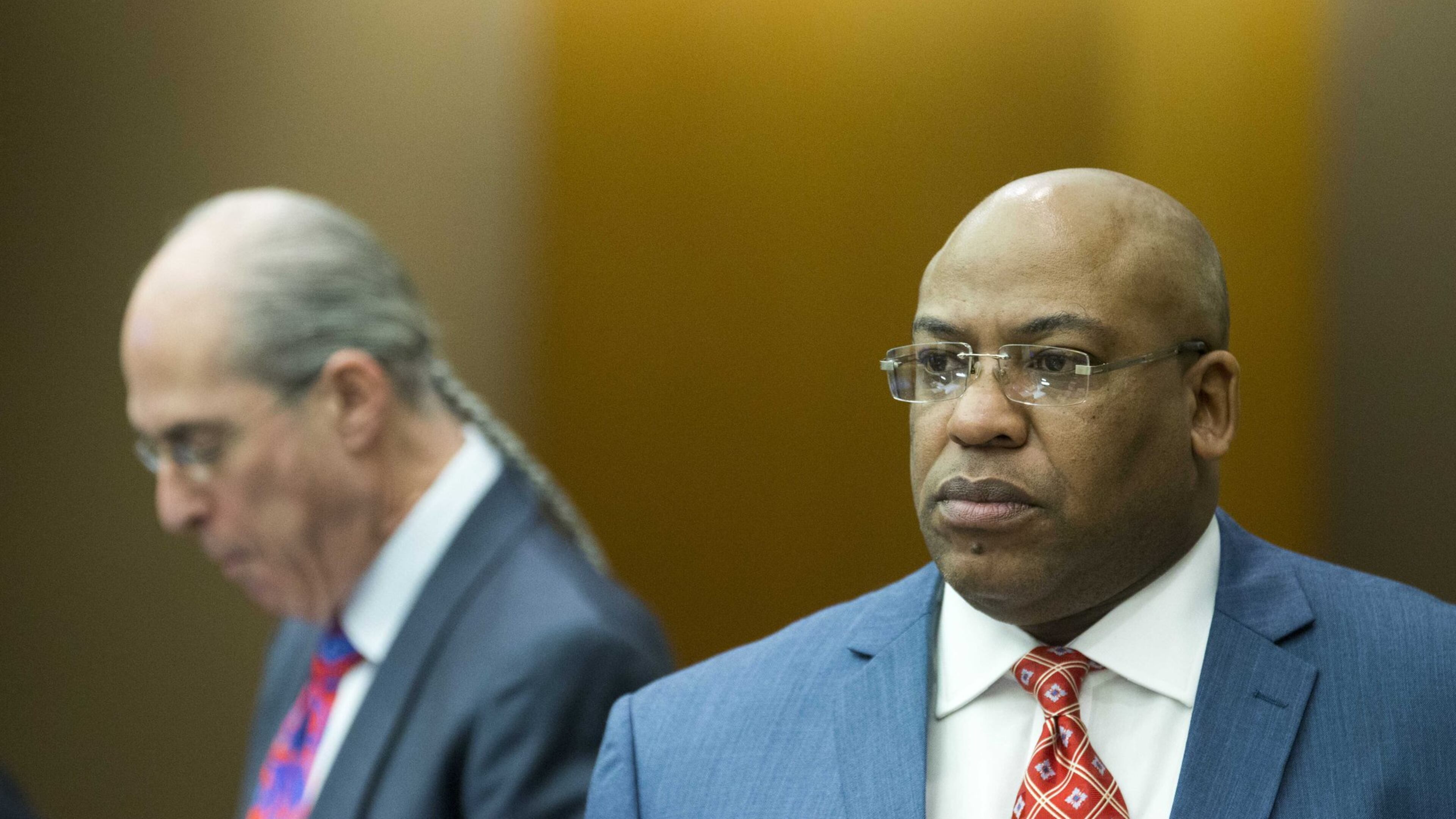 04/10/2018 — Atlanta, GA - Fulton County Chief Assistant District Attorney Clint Rucker, right, debates with defense attorney Bruce Harvey, left. ALYSSA POINTER/ALYSSA.POINTER@AJC.COM