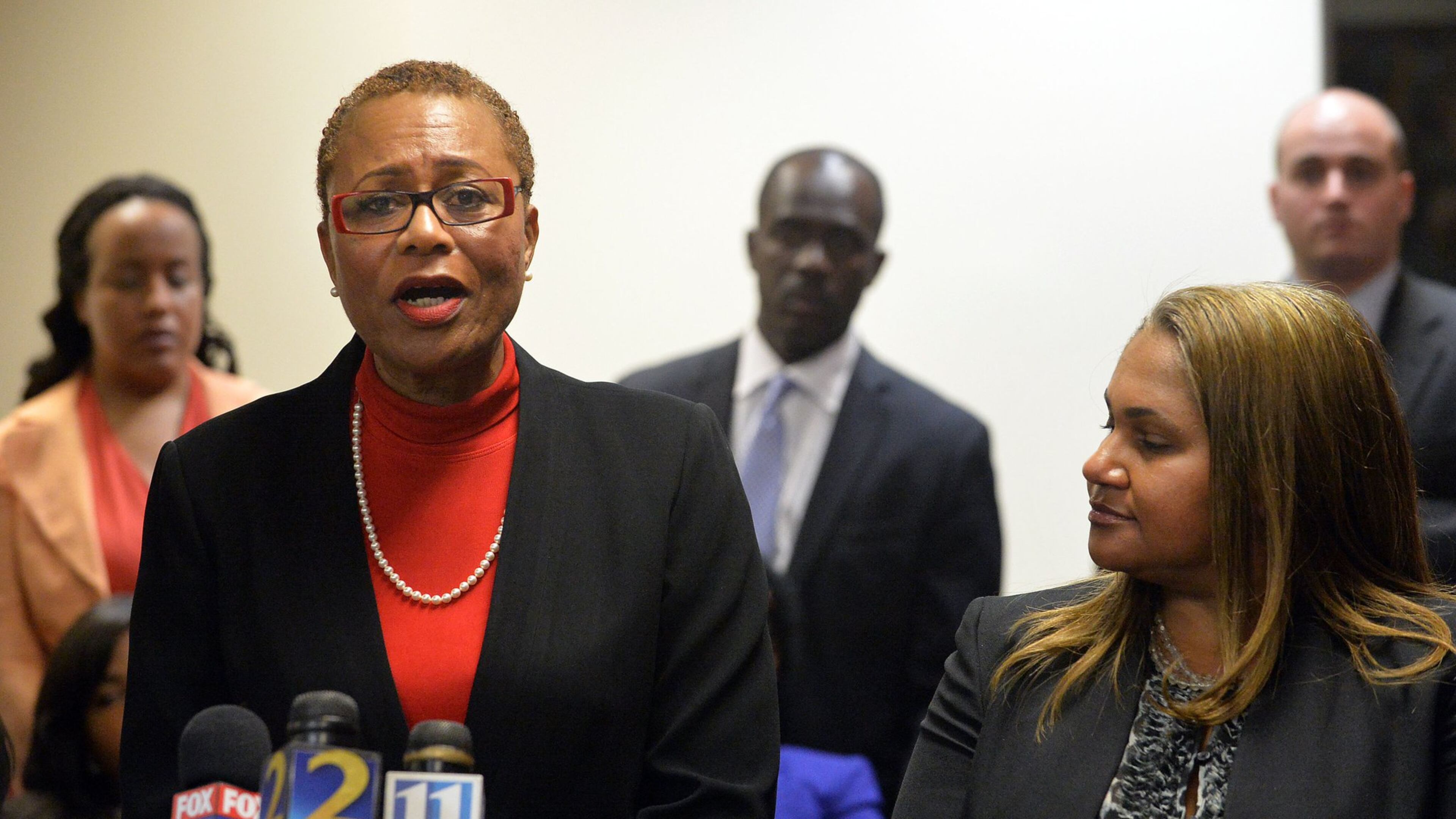 Sharon Davis-Williams, one of three former Atlanta Public Schools regional directors found guilty on April 1 in a massive test-cheating trial, speaks Friday as her attorney, Teresa Mann, listens during a news conference held at the Atlanta law offices of George Lawson, defense attorney for convicted former APS regional director Michael Pitts. (KENT D. JOHNSON /KDJOHNSON@AJC.COM)
