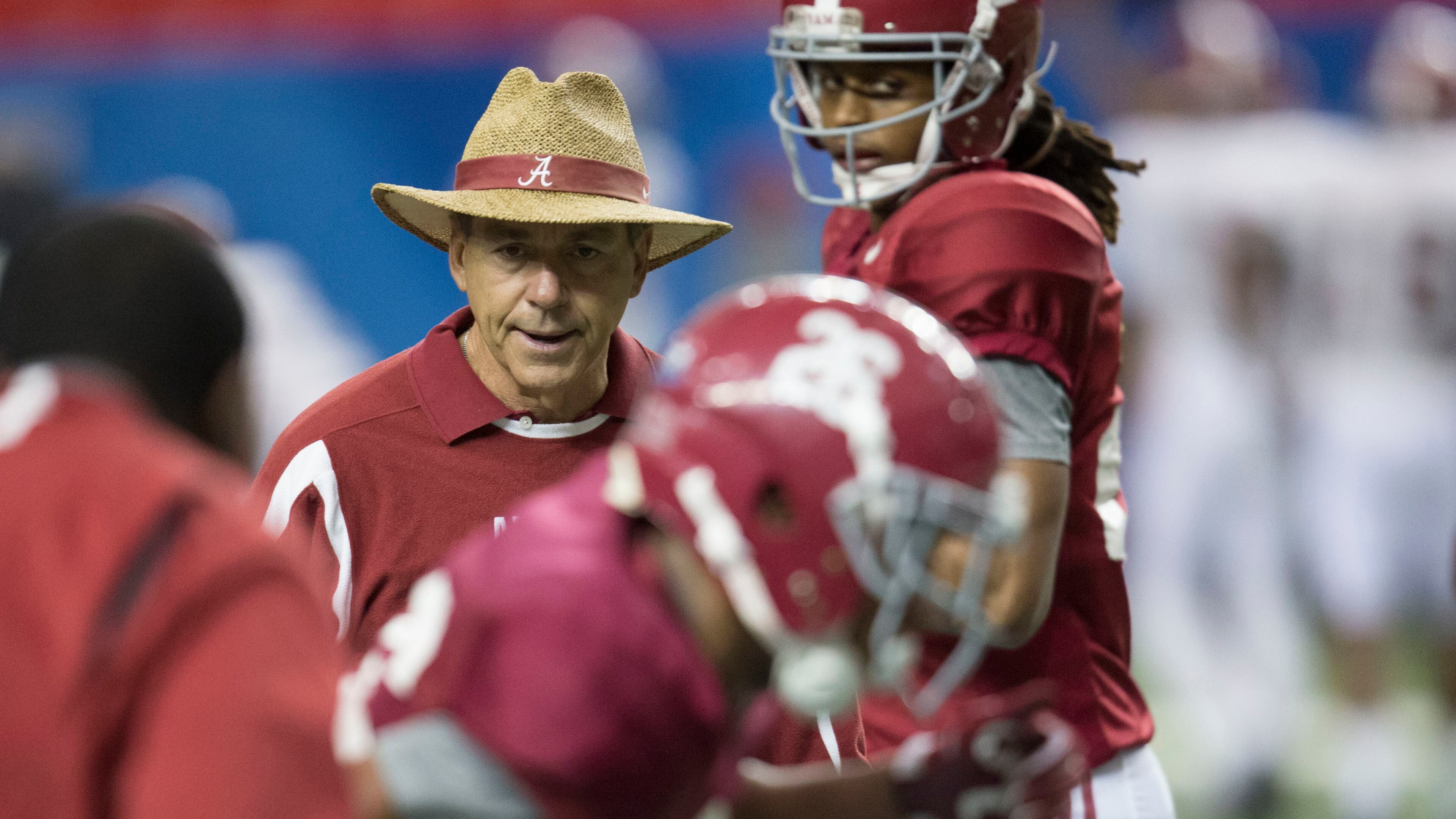 Alabama head coach Nick Saban works with his players during Alabama's Peach Bowl football practice, Tuesday, Dec. 27, 2016, at the Georgia Dome in Atlanta, Ga. (Vasha Hunt/AL.com via AP)