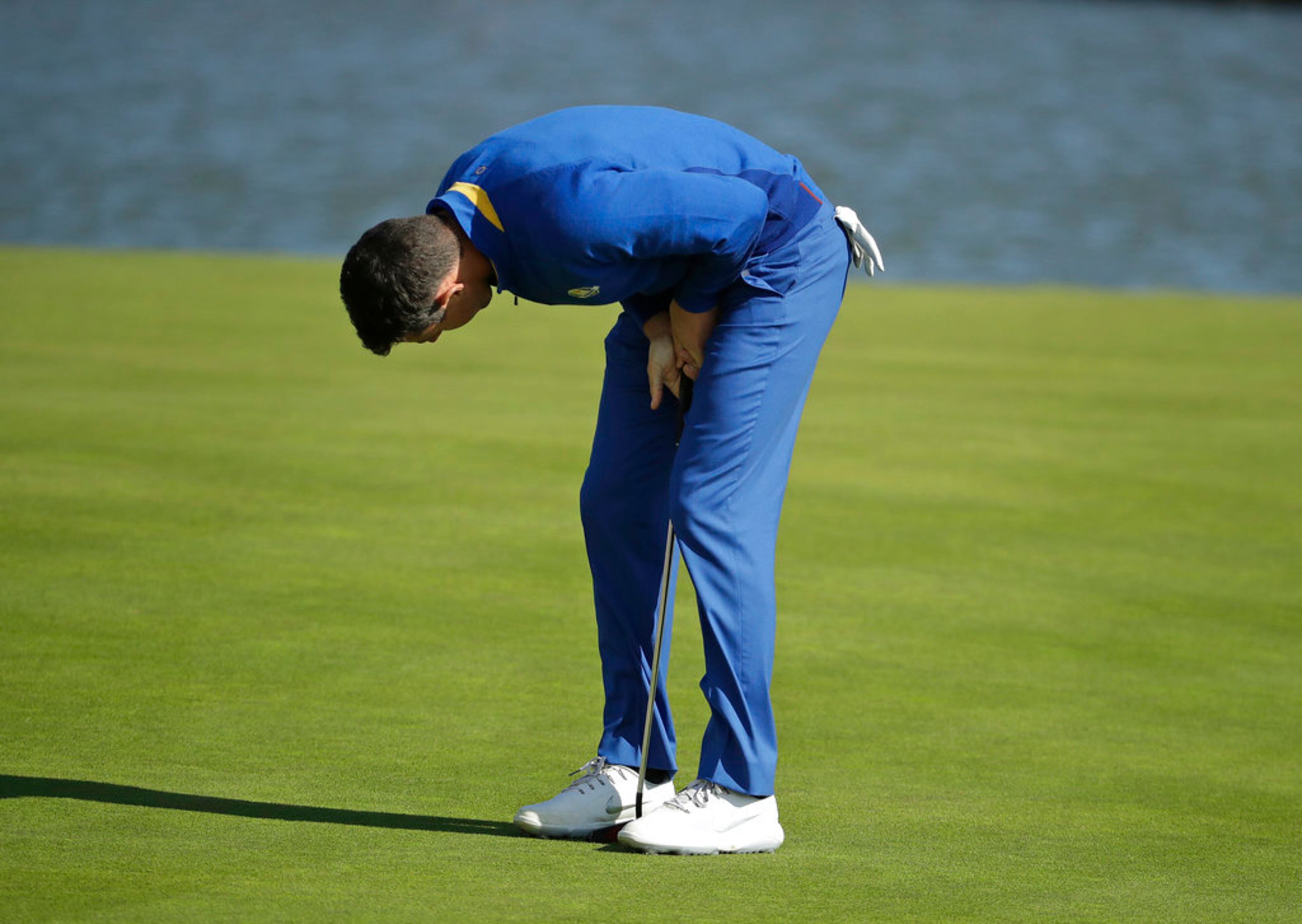 Europe's Rory McIlroy reacts to a missed putt on the 15th during a singles match on the final day of the 42nd Ryder Cup at Le Golf National in Saint-Quentin-en-Yvelines, outside Paris, France, Sunday, Sept. 30, 2018. (AP Photo/Matt Dunham)