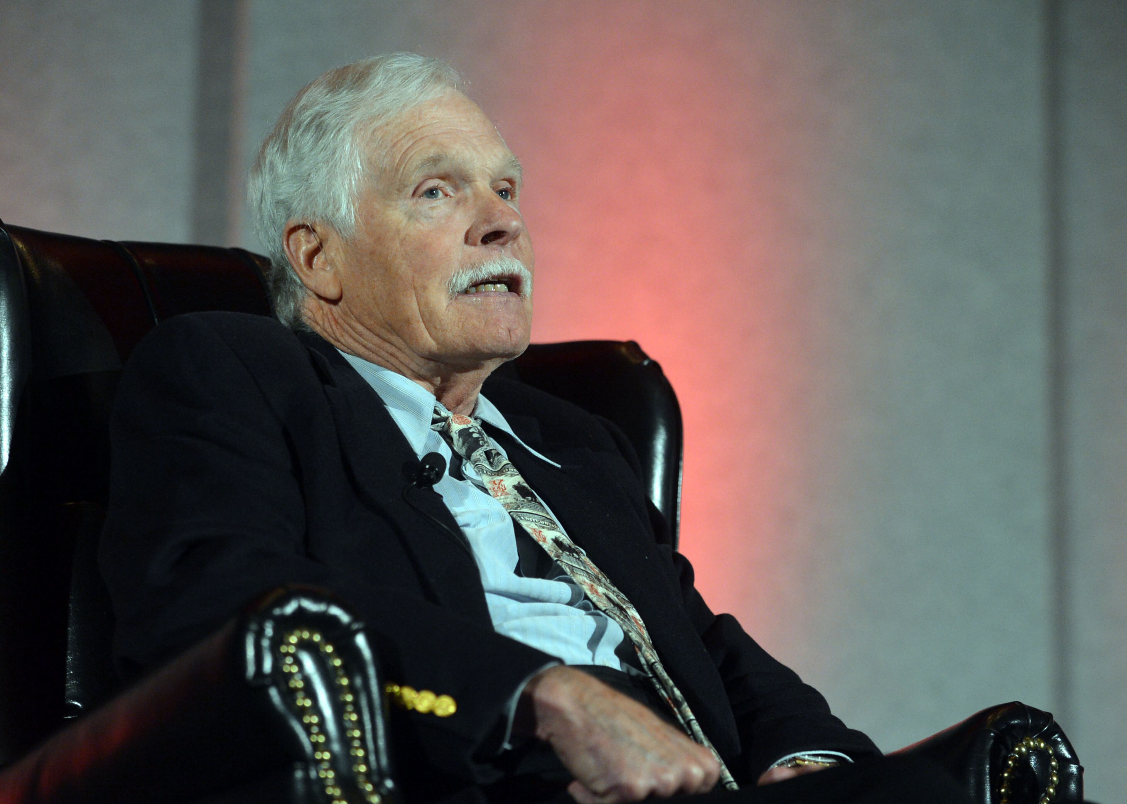 Ted Turner, back from hospitalization in South America, talks during the Technology Association of Georgia 2014 Technology Summit at the Cobb Galleria Centre Wednesday, March 26, 2014. Turner, the Atlanta billionaire and founder of Turner Broadcasting System, suffered from appendicitis while in the Patagonia region earlier this month. He underwent surgery at a hospital in Buenos Aires. On March 10, he thanked supporters and well-wishers, noting he was recuperating and “looking forward to getting back to business as usual.”