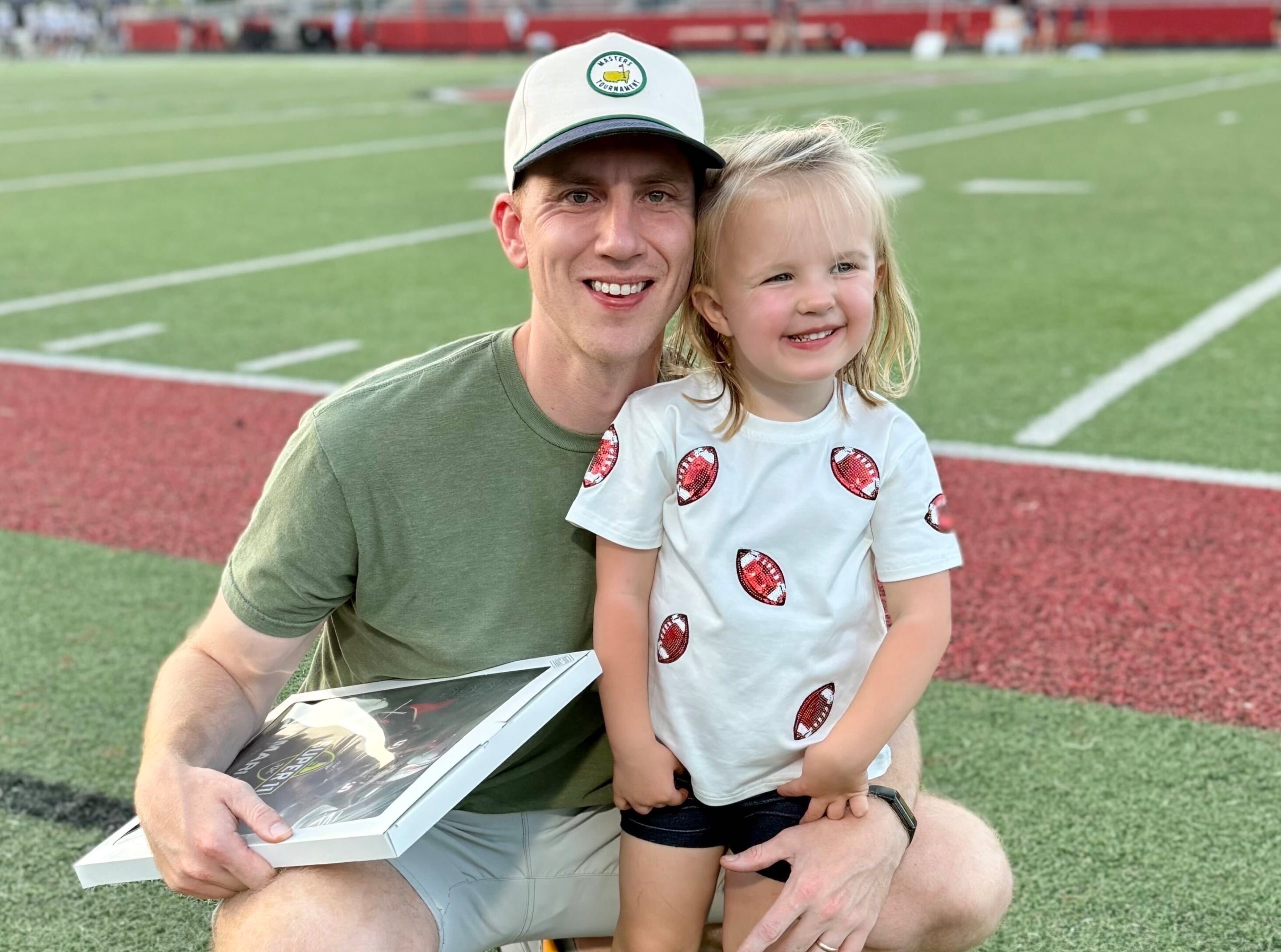 Fletcher Page, the AJC's new Georgia Tech beat writer, with daughter Bizzy, 4. (Family photo)
