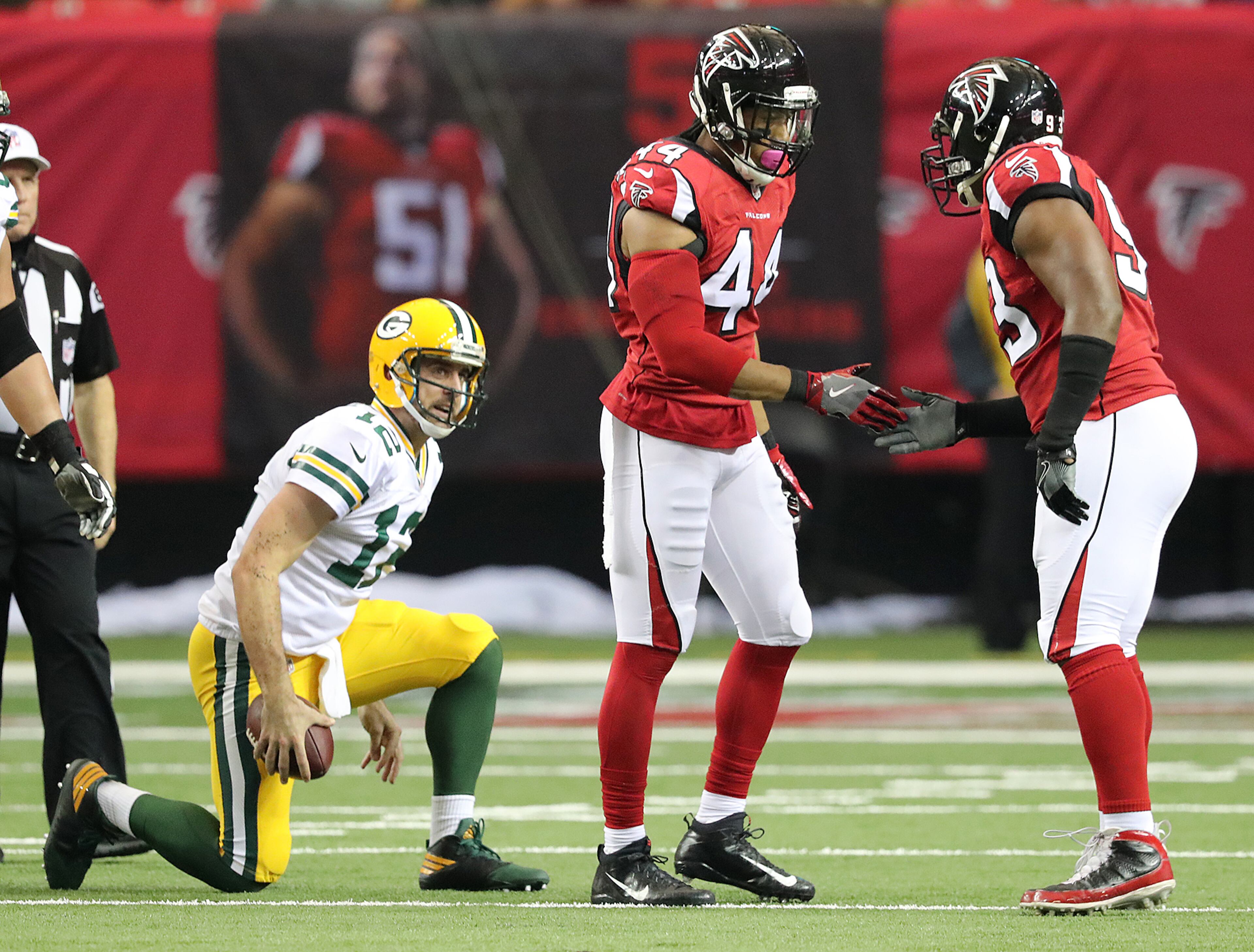 October 30, 2016 ATLANTA: Falcons Vic Beasley Jr. celebrates sacking Packers Aaron Rodgers with Dwight Freeney during the first half in an NFL football game on Sunday, Oct. 30, 2016, in Atlanta. Curtis Compton /ccompton@ajc.com