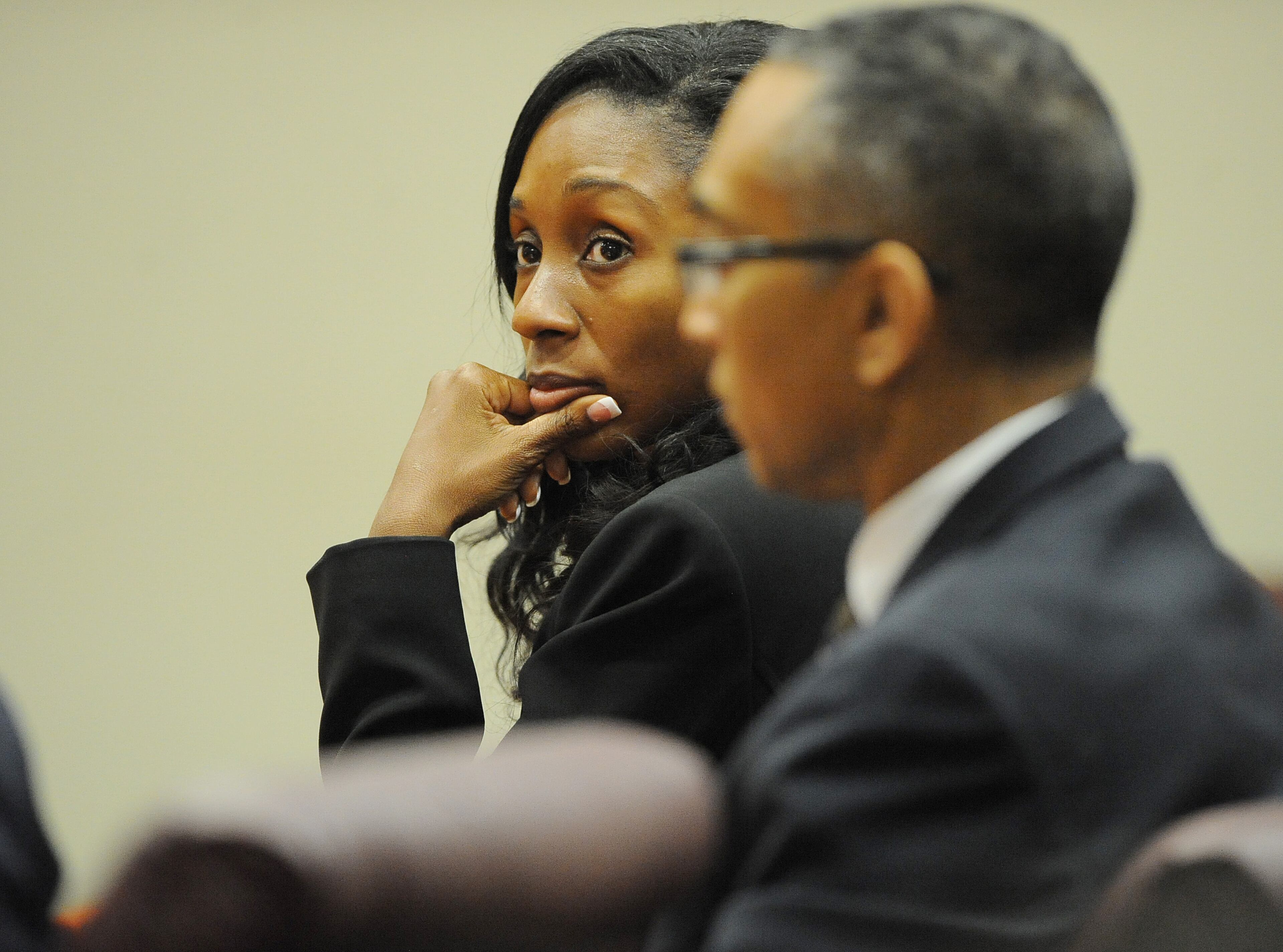 UPDATE: On July 1, Burrell Ellis was found guilty on three counts of perjury and one count of attempt to extort out of nine total counts against him. June 30 -- Defense attorney Kemay Jackson listens to the response to a jury question as deliberations continue for a fifth day in the retrial of embattled DeKalb CEO Burrell Ellis before Superior Court Judge Courtney Johnson Monday, June 30, 2015.