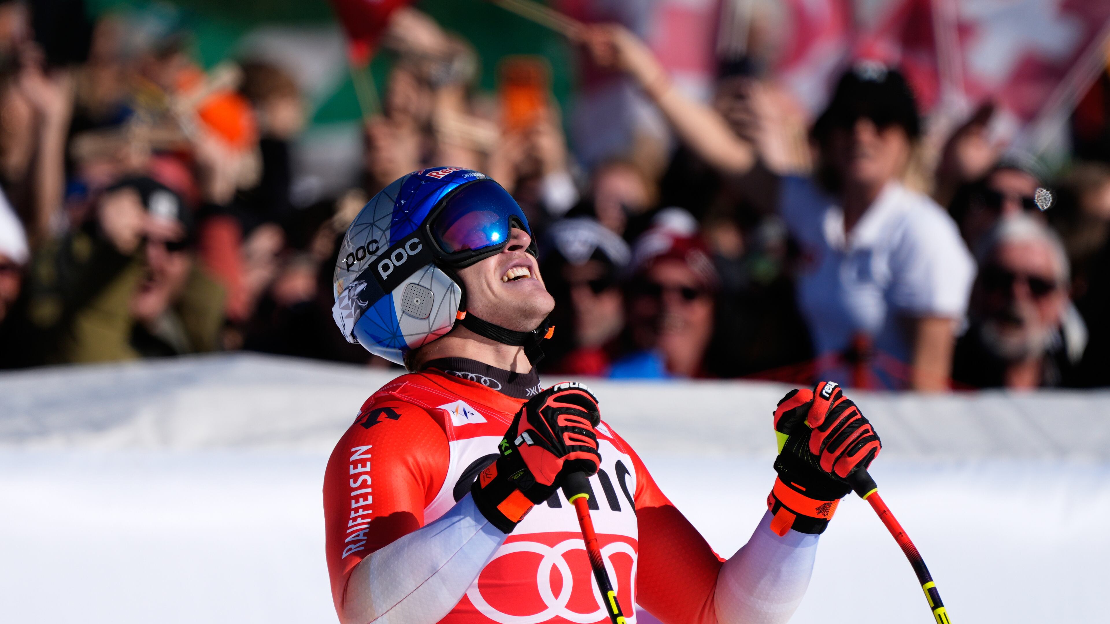 Switzerland's Marco Odermatt reacts at the finish area, during a men's World Cup downhill race, in Garmisch Partenkirchen , Germany, Saturday, Feb. 28, 2026. (AP Photo/Giovanni Auletta)