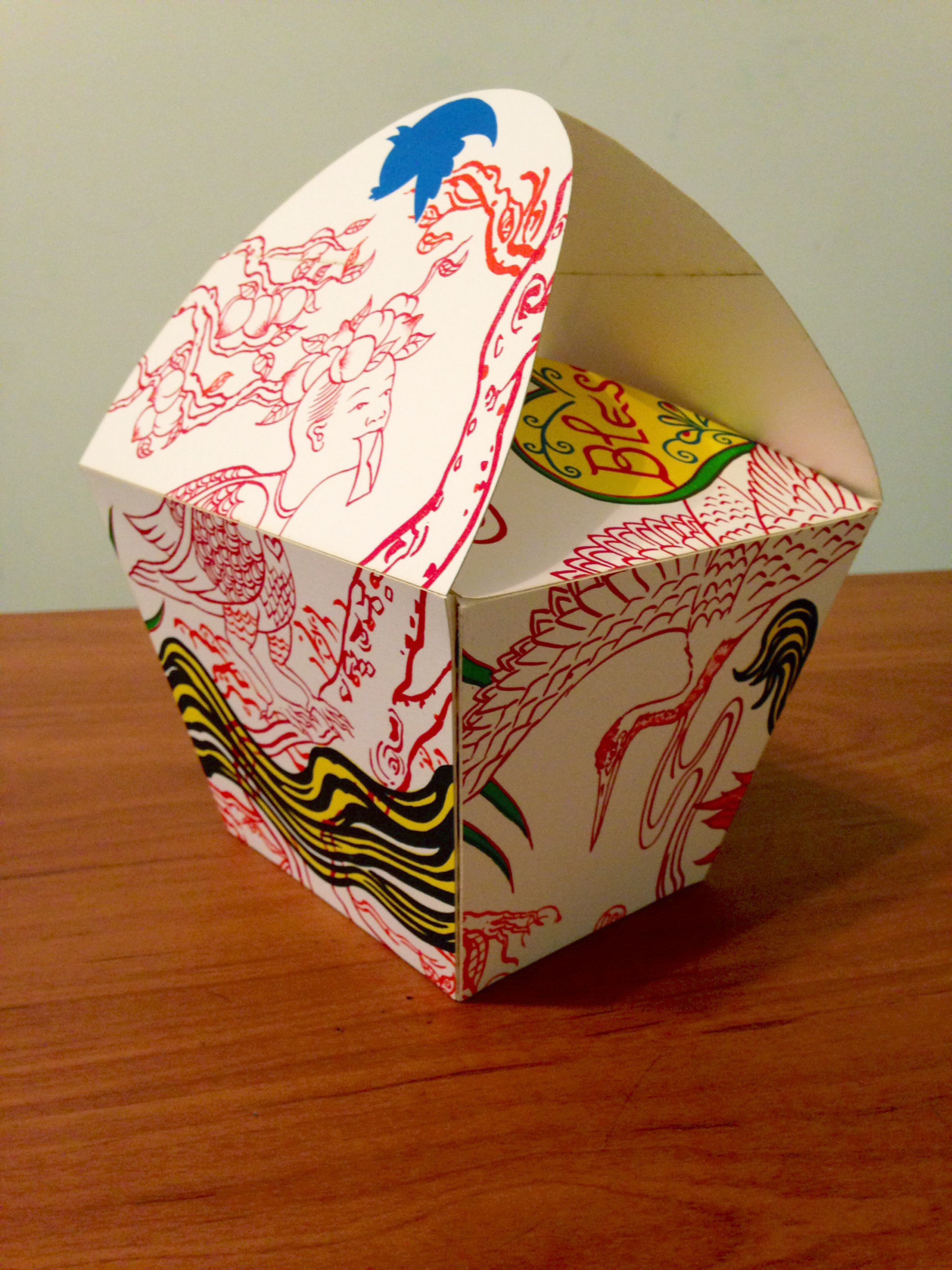 Korean-born Atlanta artist Jiha Moon creates 3-D lithographs that couple the spirit of classic Oriental silk screens with contemporary pop elements. This one, "Take Out," folds into, appropriately enough, a takeout-style box. See Moon's work at Swan Coach House Gallery in Atlanta Tuesdays-Saturdays through Jan. 2. Photo credit: Jiha Moon