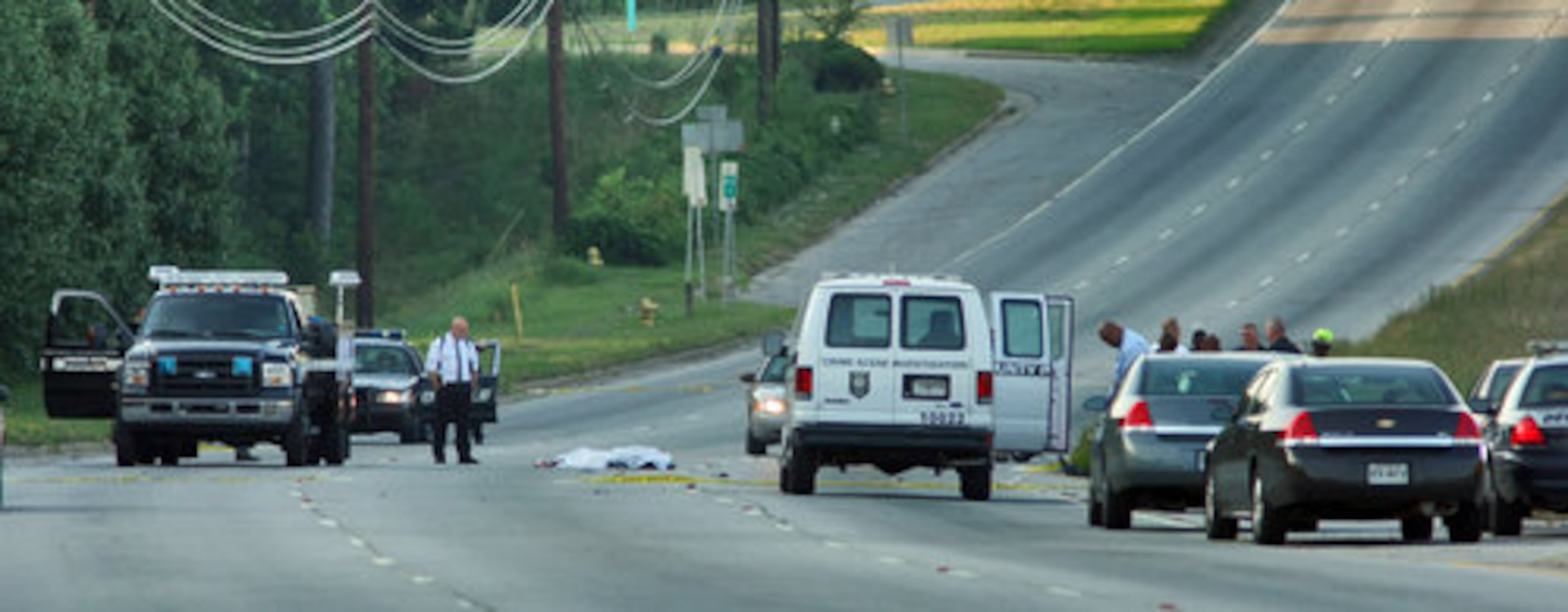 The northbound lanes of Moreland Avenue near I-285 were shut down Friday morning as DeKalb County police investigated a body found in the roadway.