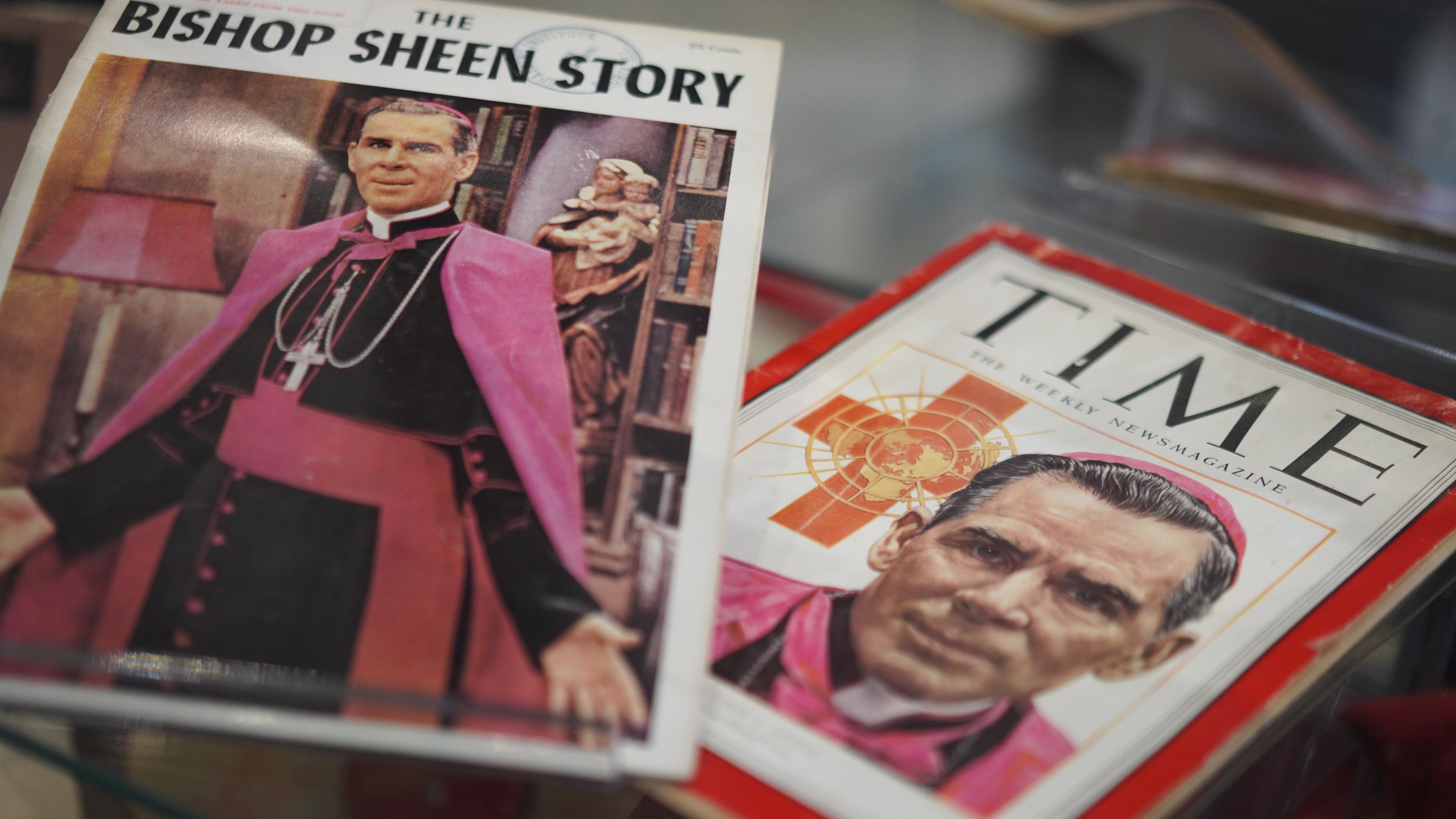 Artifacts and memorabilia depicting the late Archbishop Fulton Sheen are displayed in the Sheen Museum on July 15, 2026, in Peoria, Ill. (AP Photo/Jessie Wardarski)