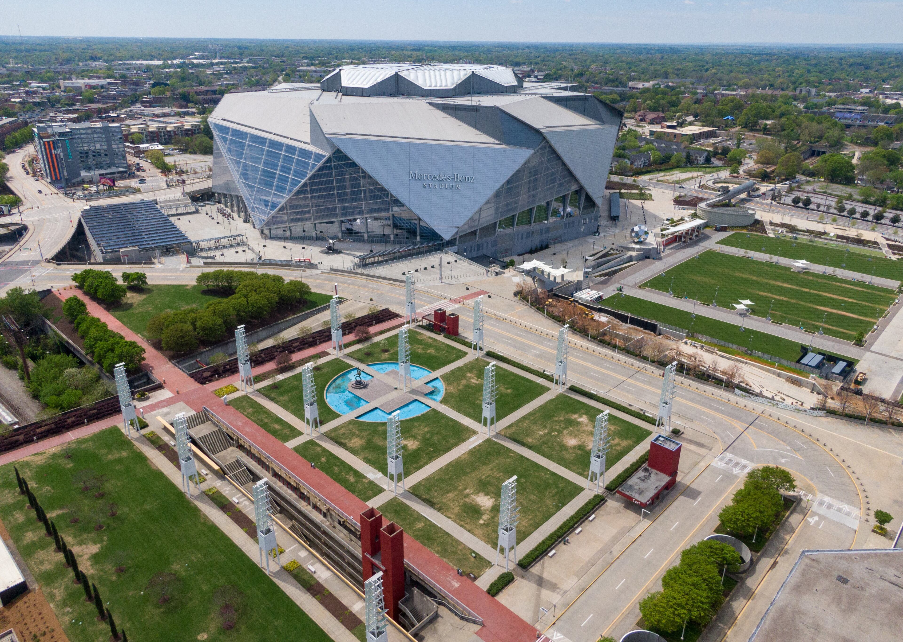 This aerial photo shows empty streets near the Mercedes-Benz Stadium in downtown Atlanta, where the Final Four would have been held. (Hyosub Shin / Hyosub.Shin@ajc.com)