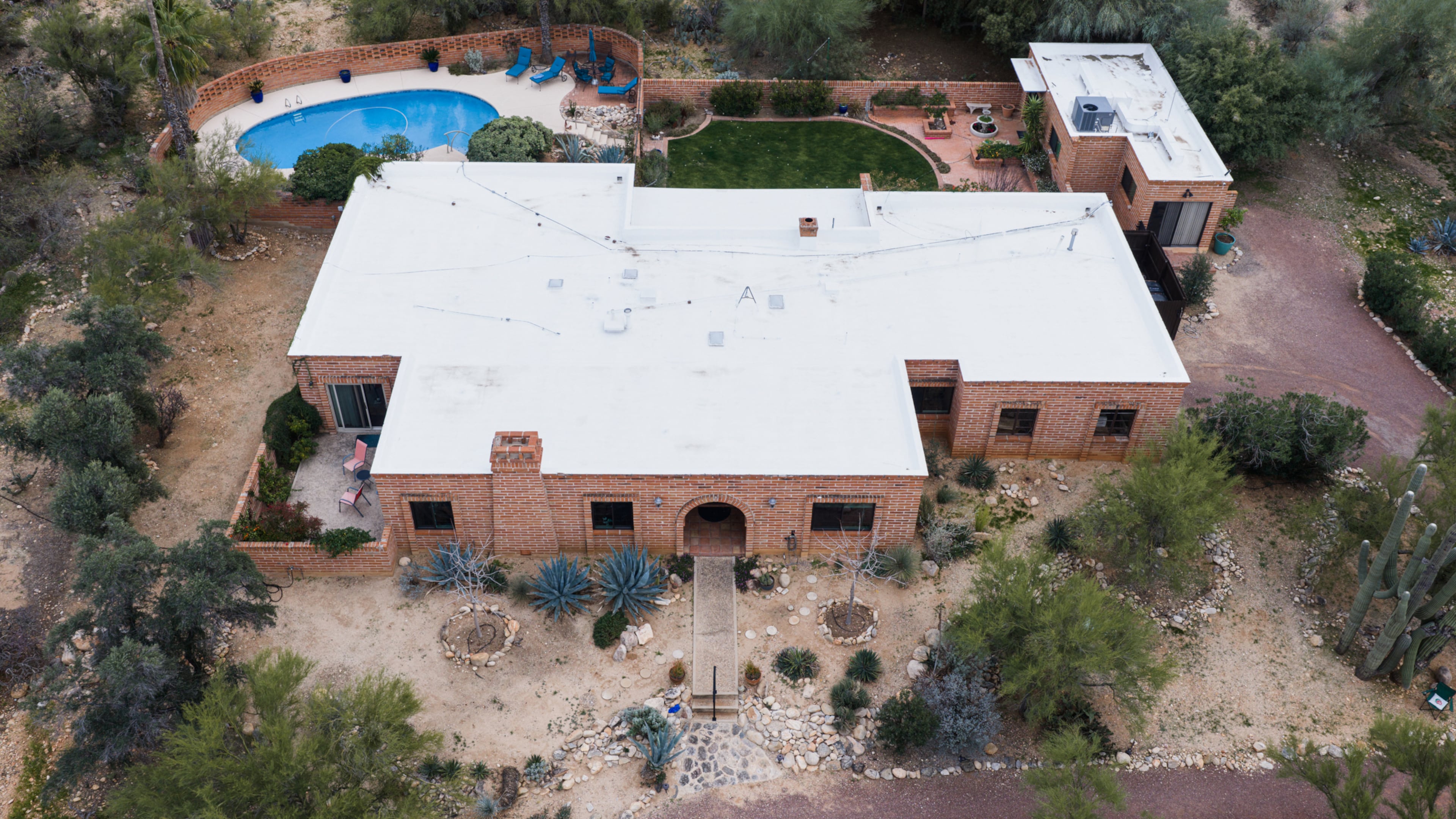 The home of Nancy Guthrie, the missing mother of “Today” show host Savannah Guthrie, is seen from above, Thursday, Feb. 5, 2026, in Tucson, Ariz. (AP Photo/Caitlin O'Hara)